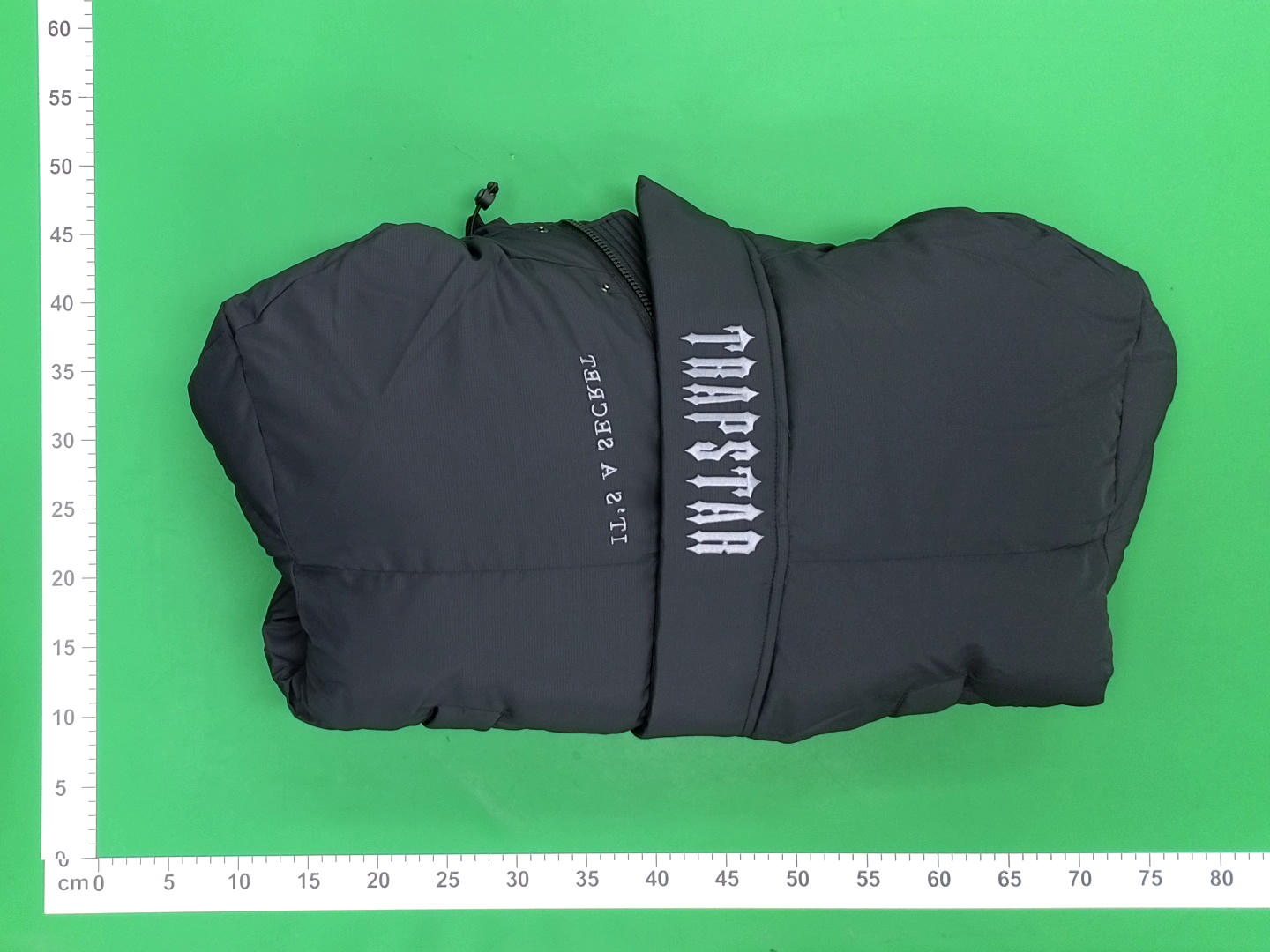 Black Puffer Jacket with Hood and Abstract Print