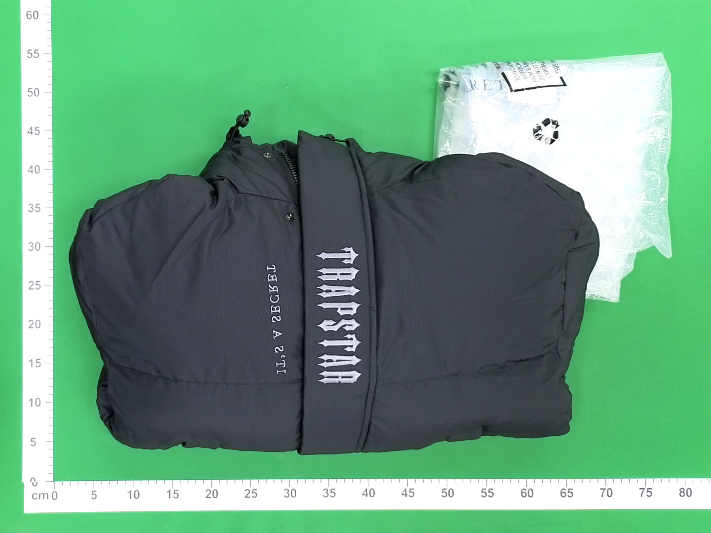 Black Puffer Jacket with Hood and Abstract Print