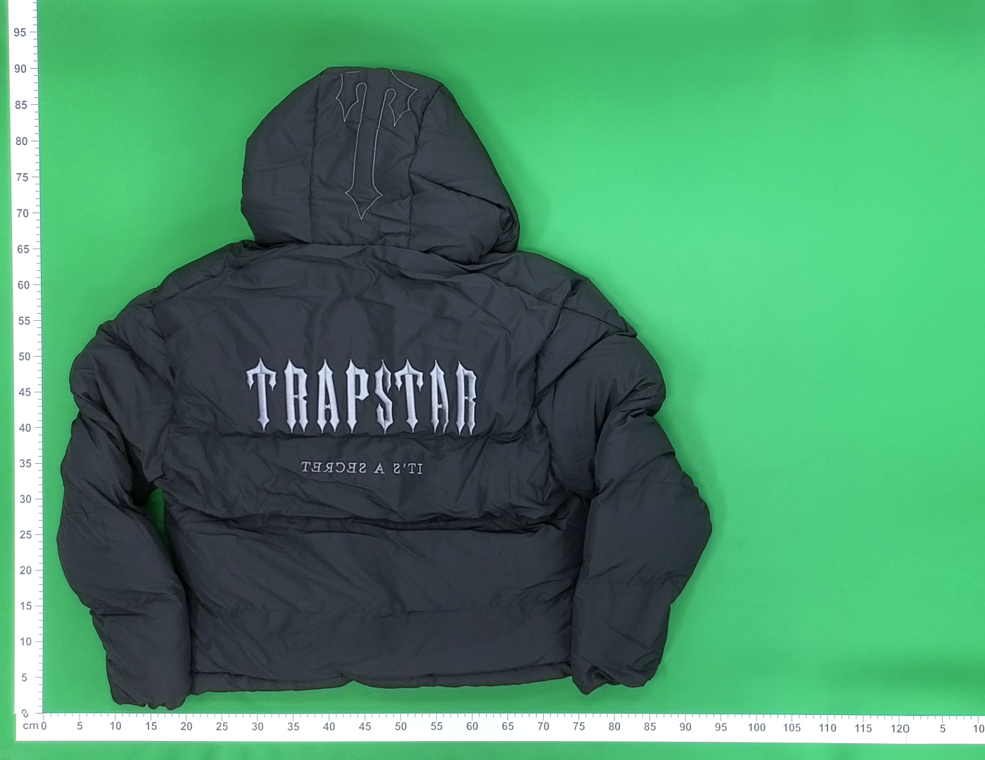Black Puffer Jacket with Hood and Abstract Print