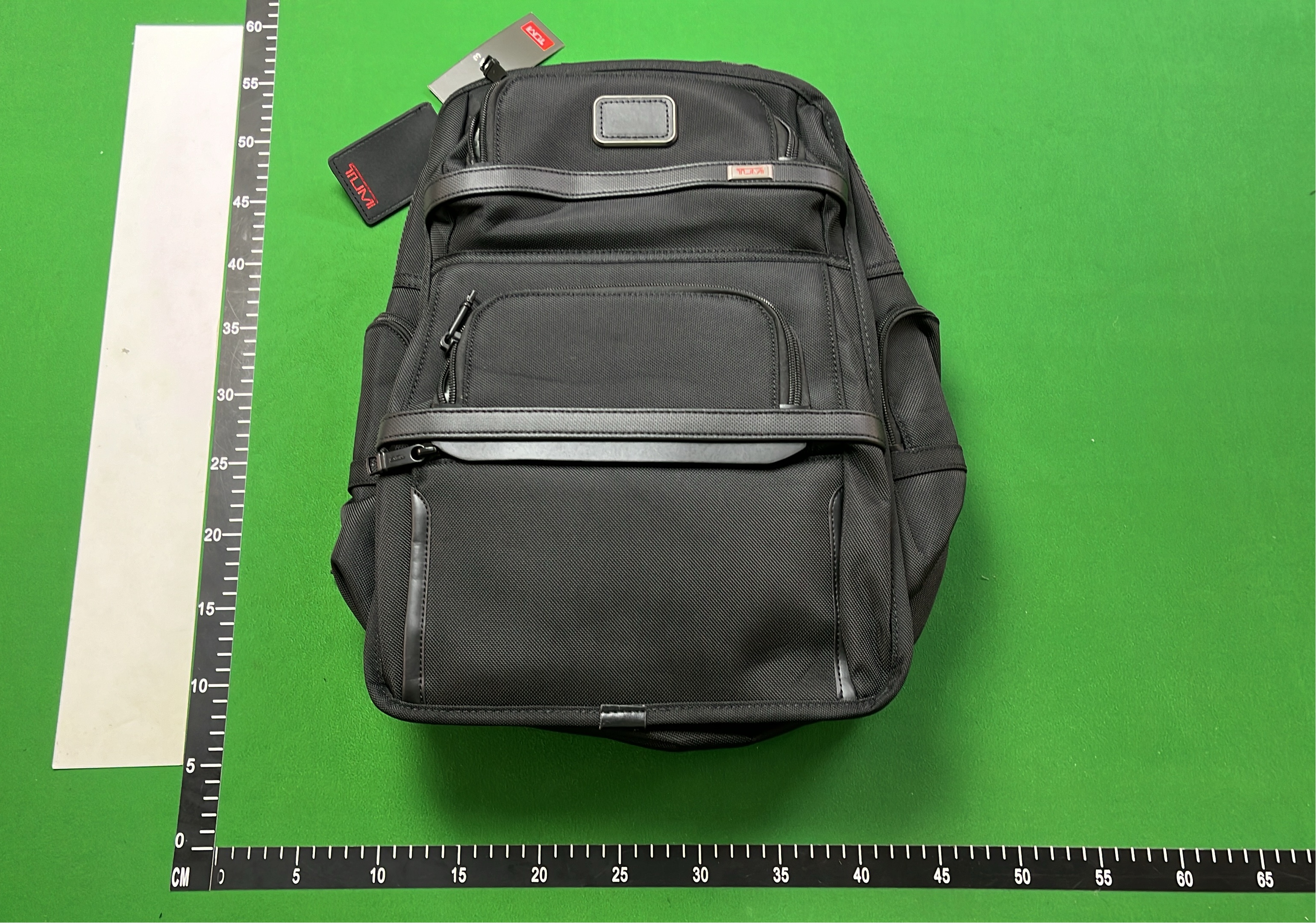 TUMI Black Business Backpack for Men with Multiple Compartments