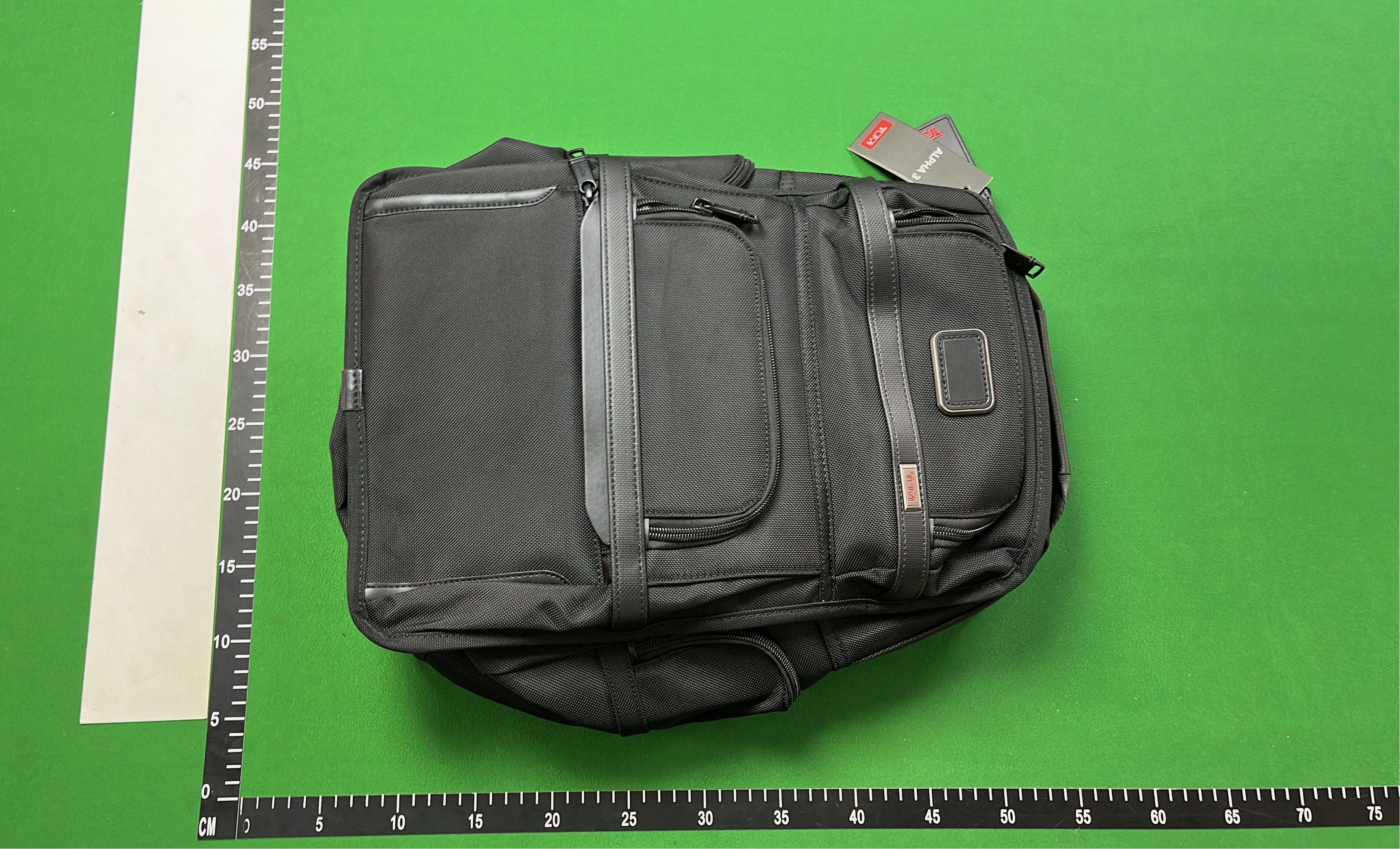 TUMI Black Business Backpack for Men with Multiple Compartments
