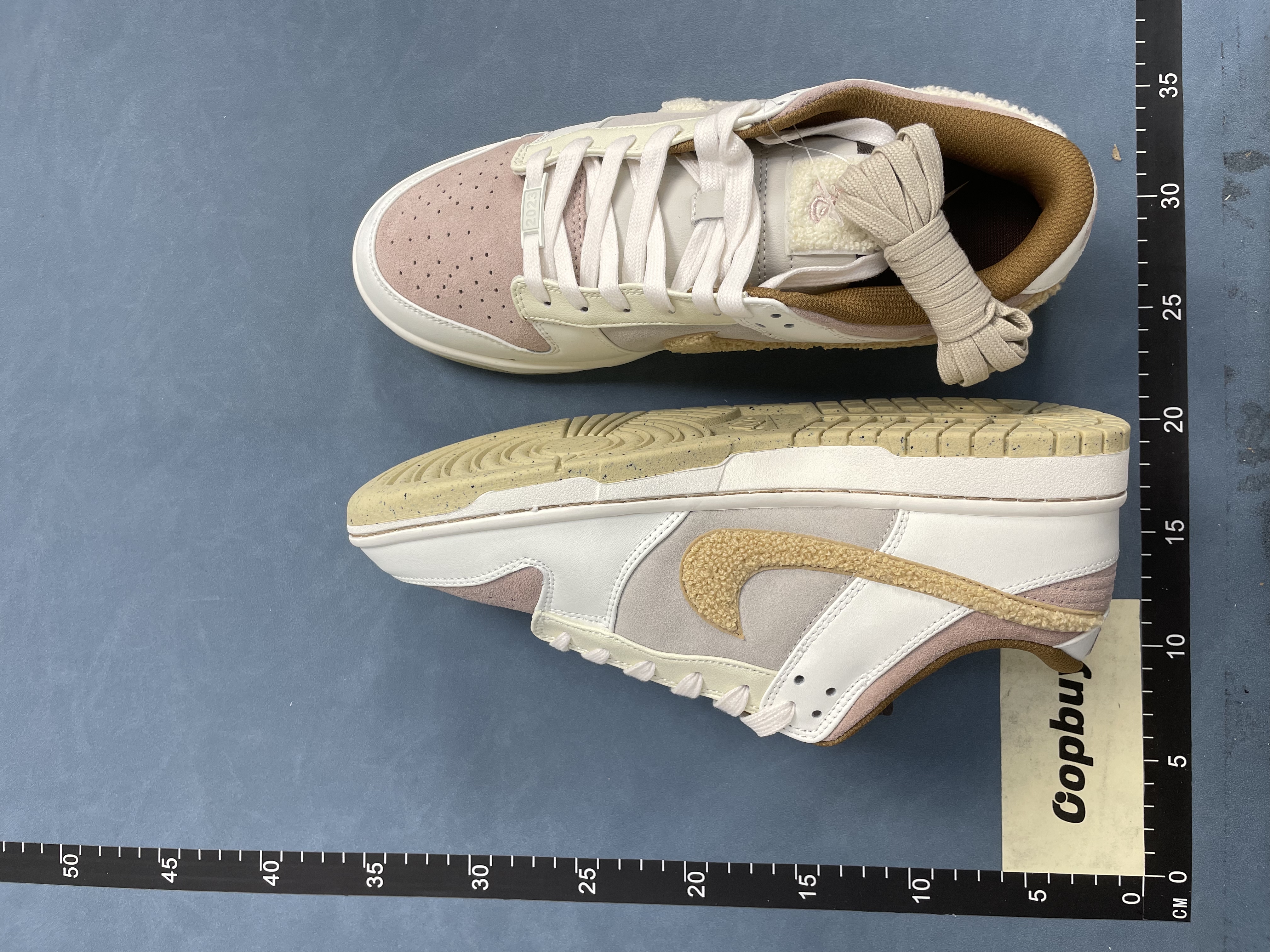 Nike Dunk Low White Beige Suede Rabbit Logo Sneakers