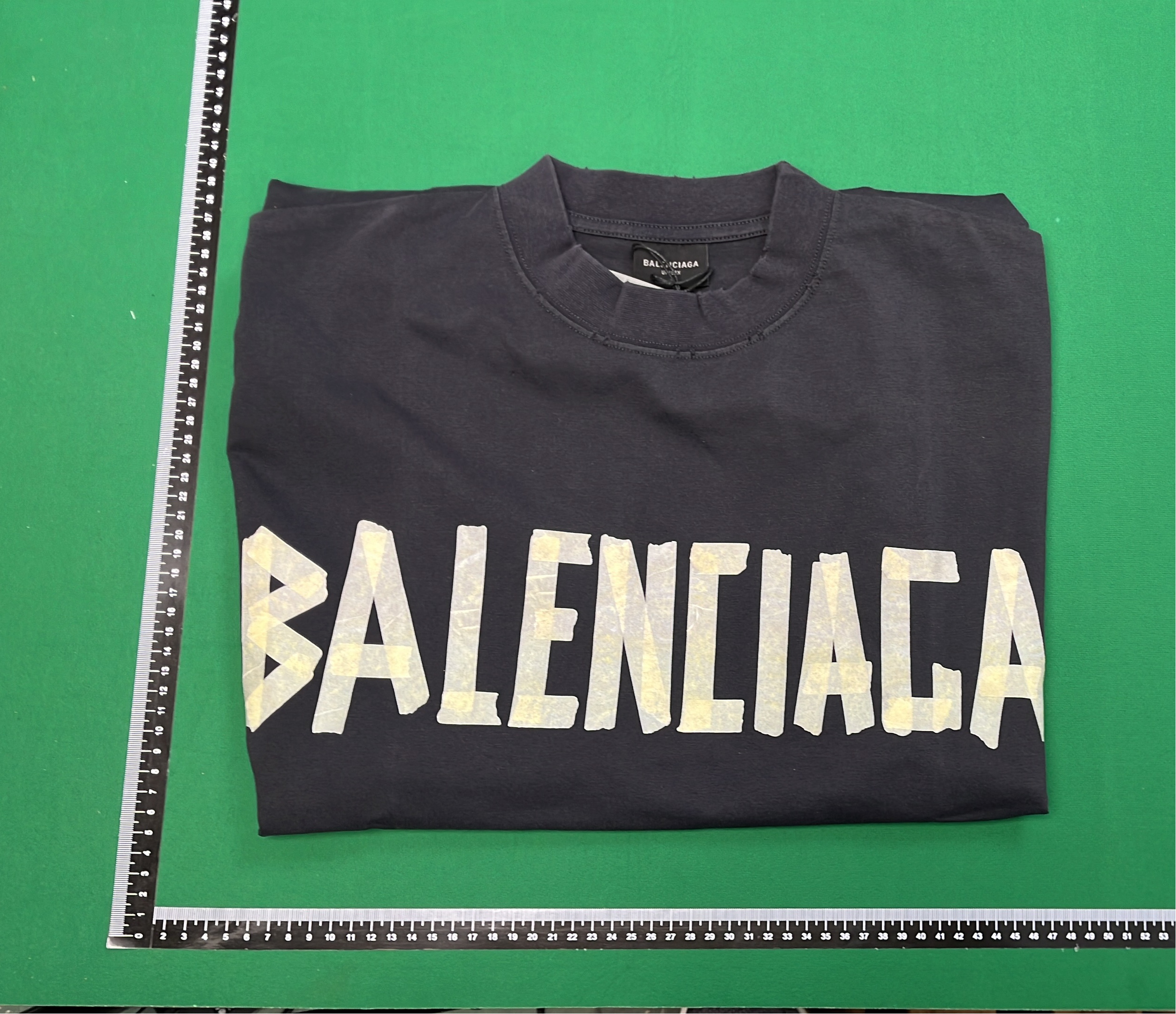 Black T-Shirt with Gold Text Design