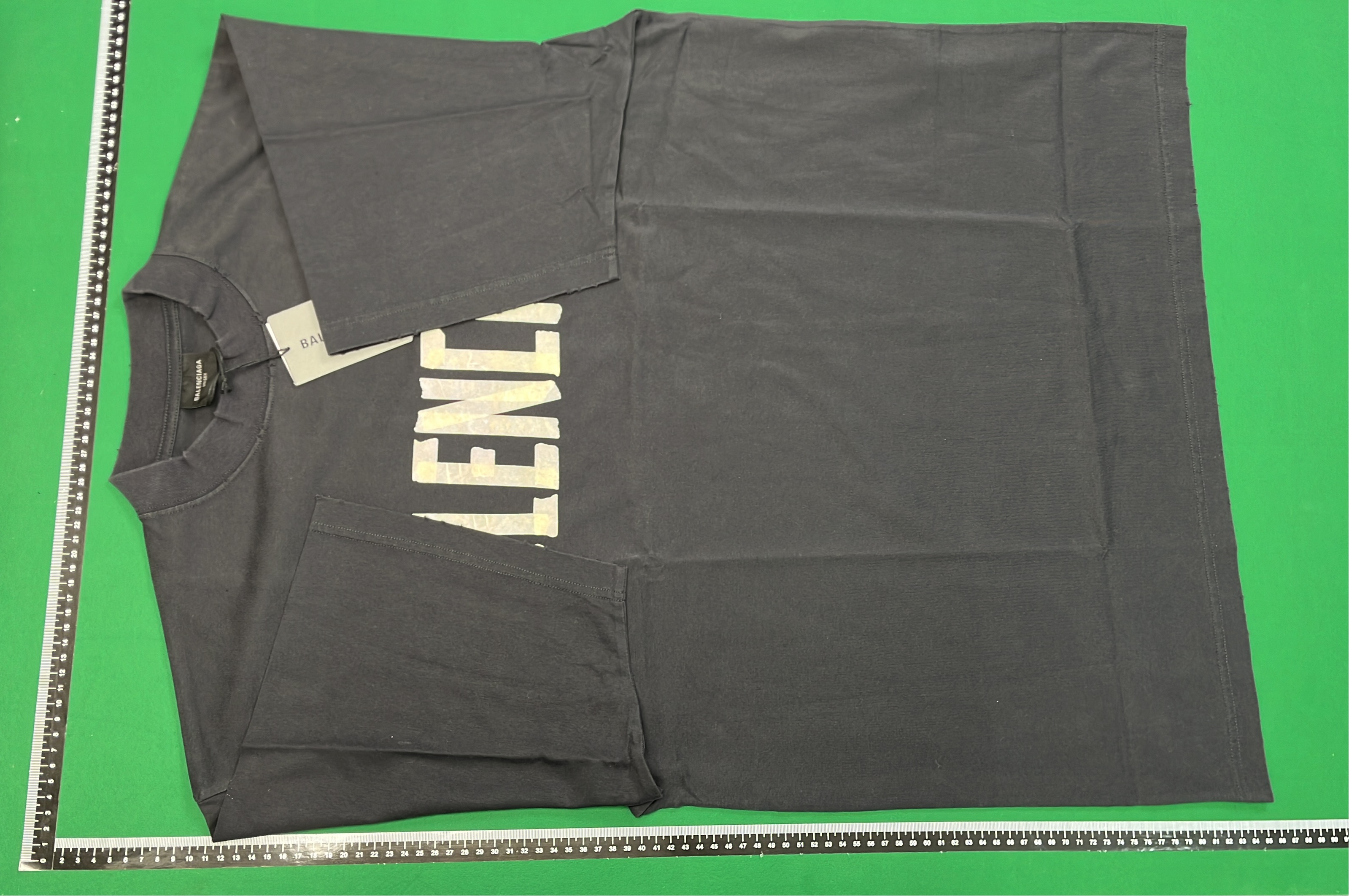 Black T-Shirt with Gold Text Design