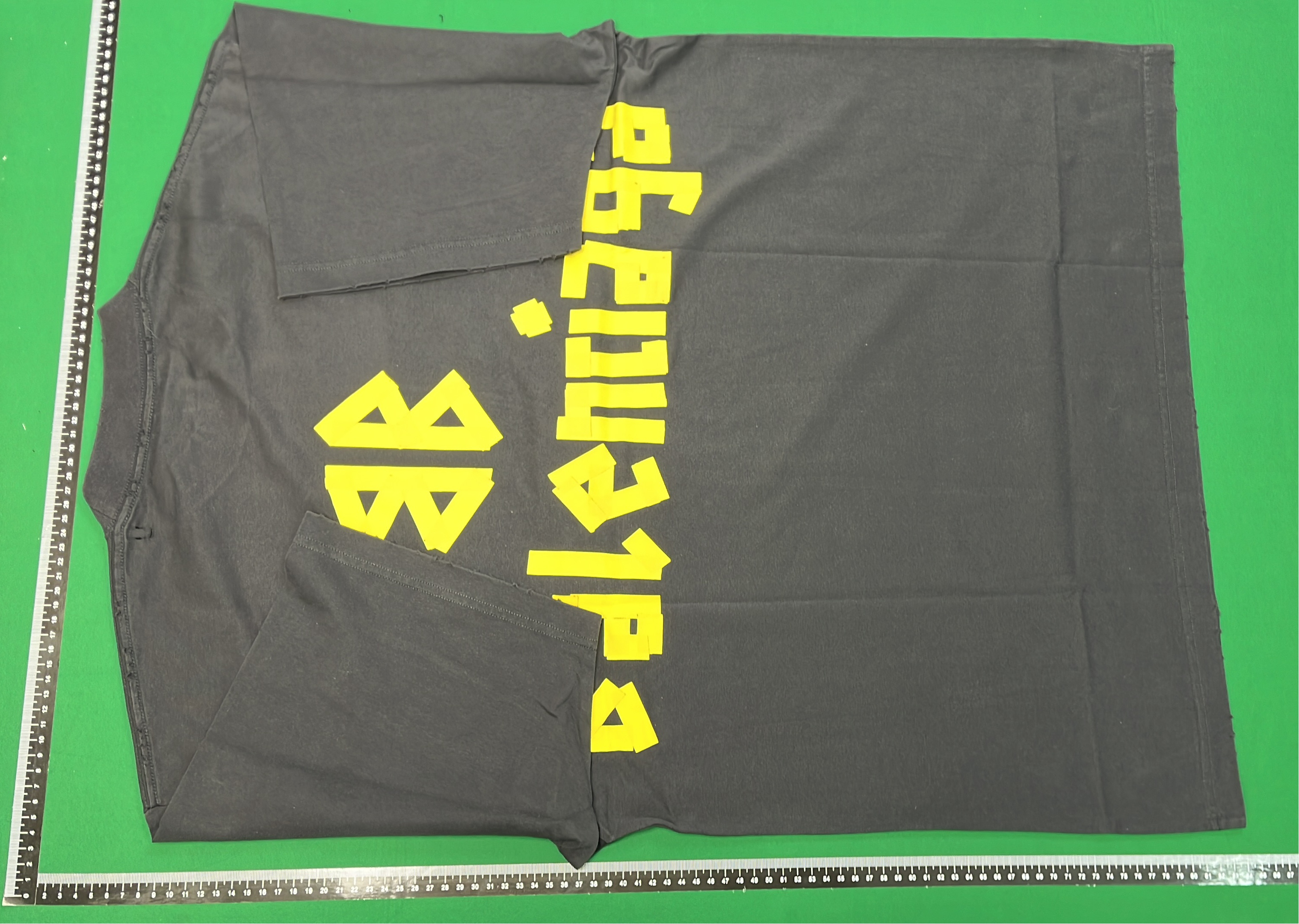 Black T-Shirt with Gold Text Design
