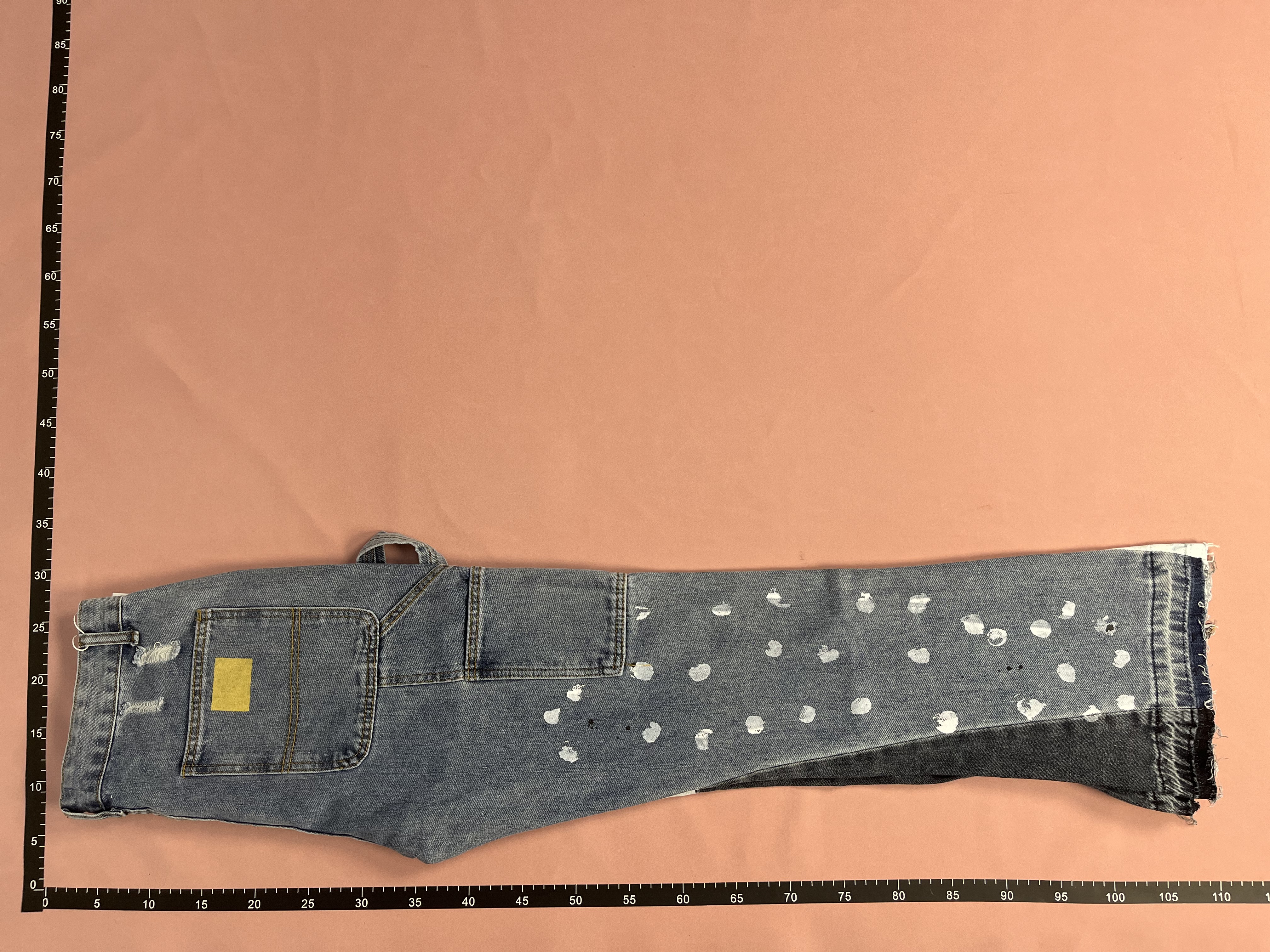 Patchwork Denim Trousers with Colorful Panels and Frayed Hem