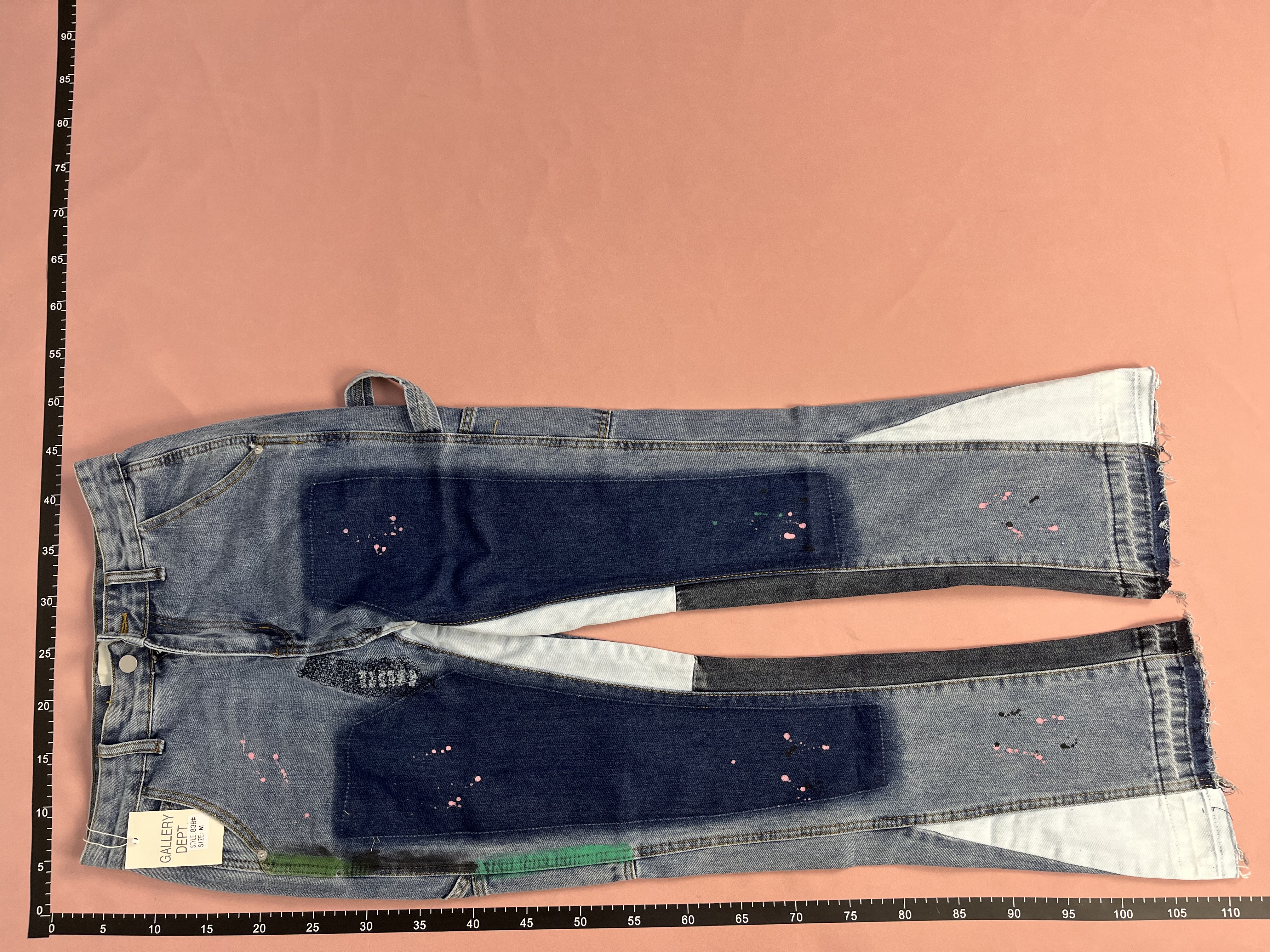 Patchwork Denim Trousers with Colorful Panels and Frayed Hem