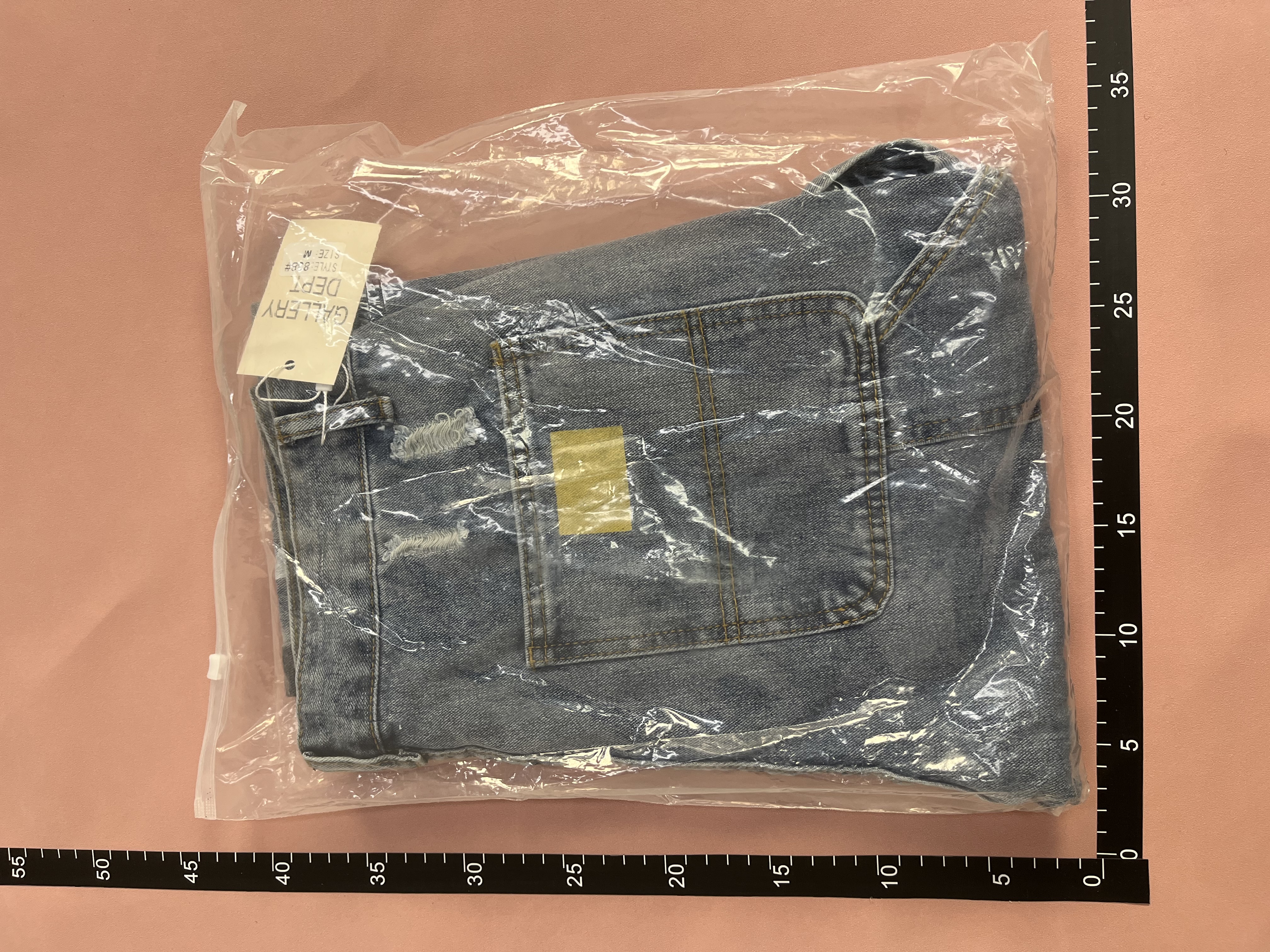 Patchwork Denim Trousers with Colorful Panels and Frayed Hem