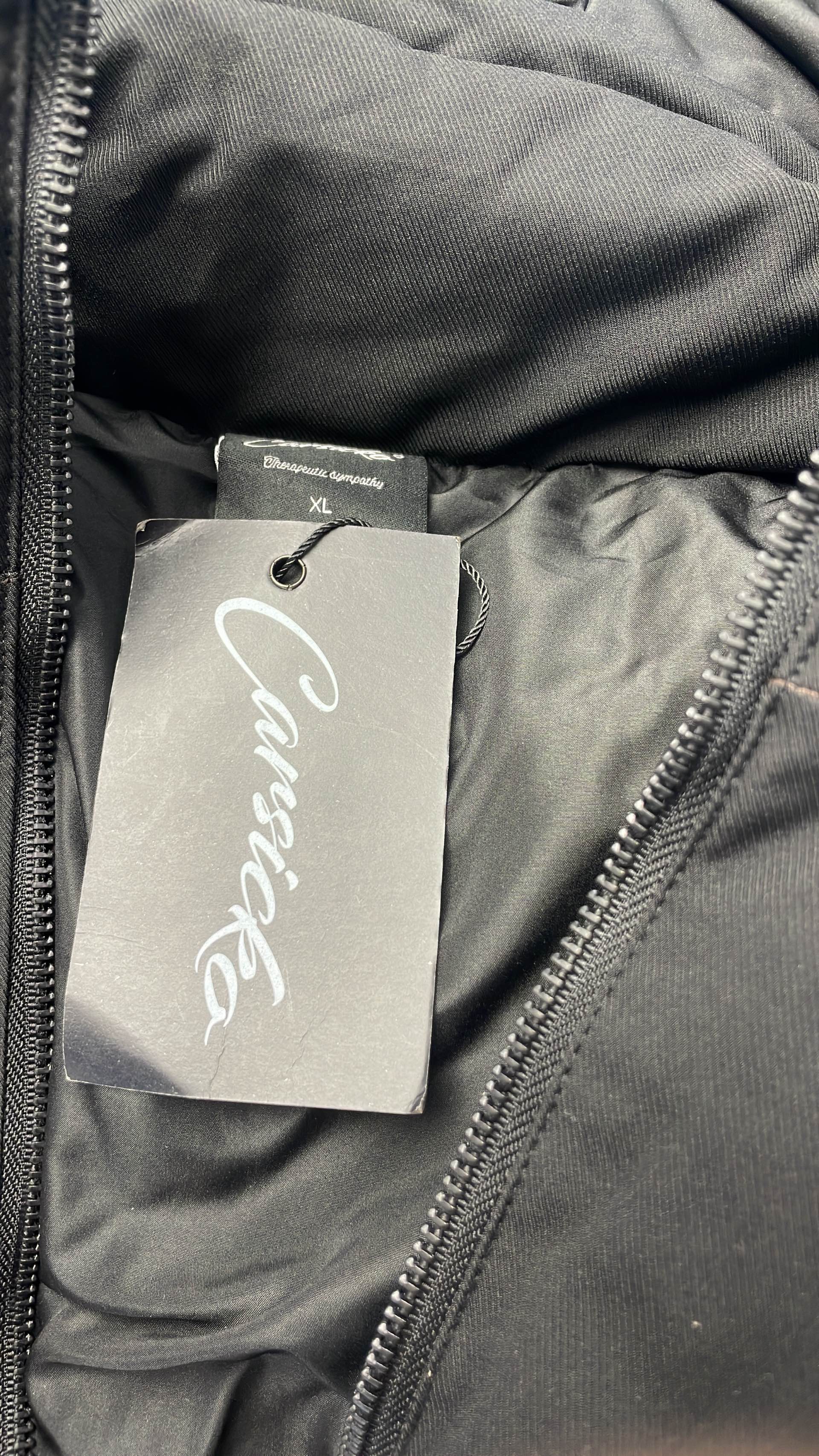 Black Hooded Puffer Jacket with Abstract Design