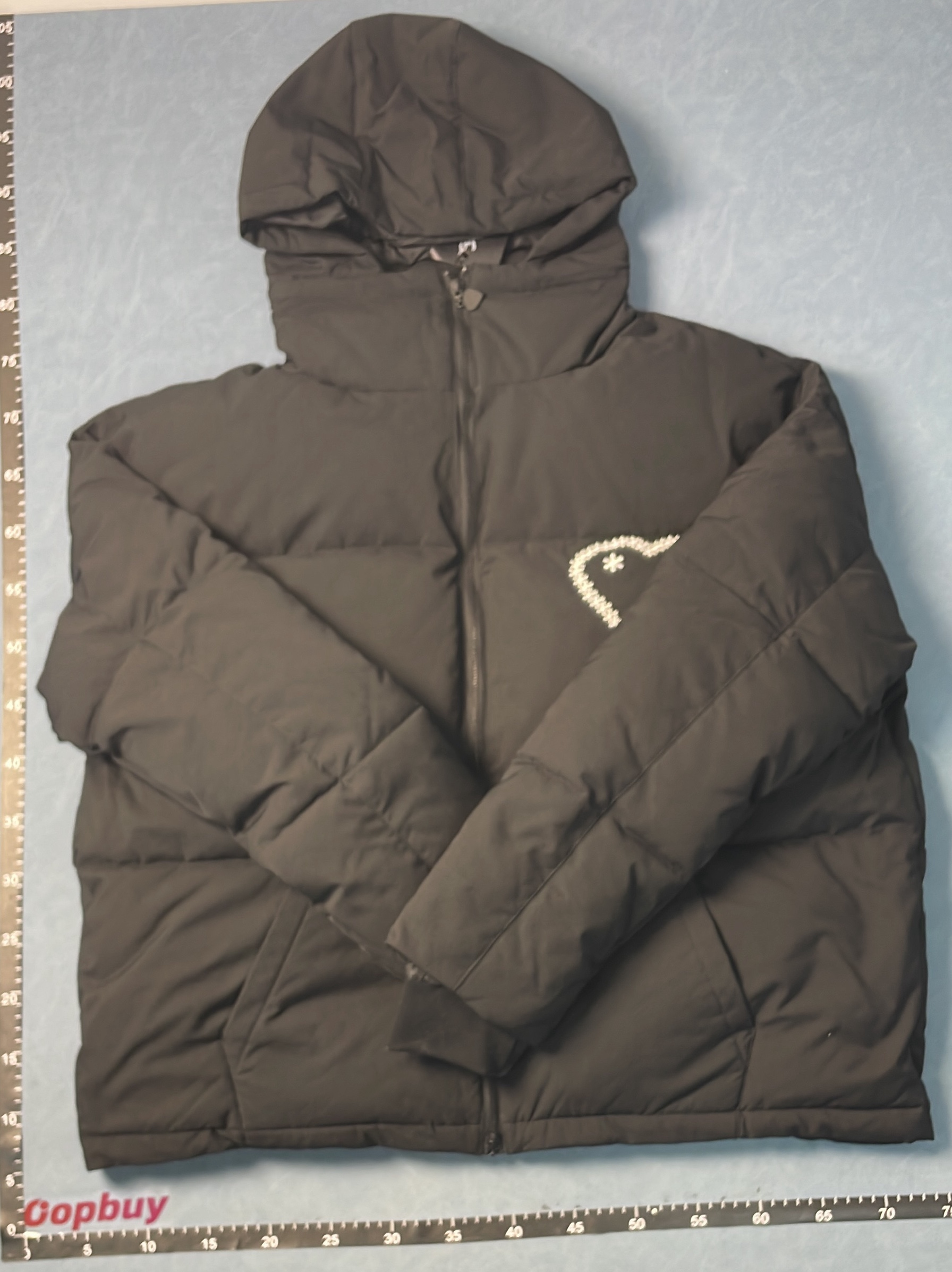 Black Hooded Puffer Jacket with Abstract Design