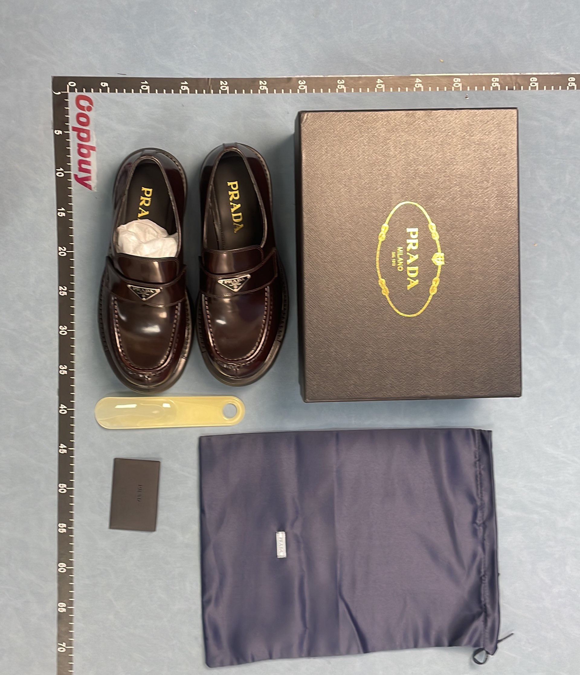 Prada Blue Patent Leather Loafers with Gold Logo