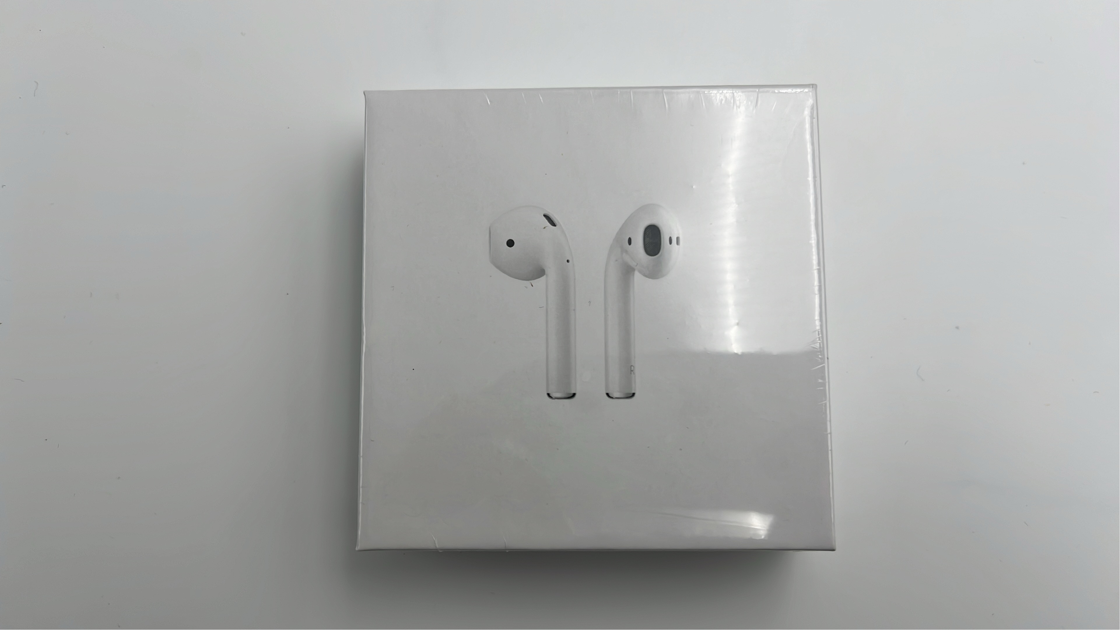 AirPods 2 Wireless Earbuds with Charging Case