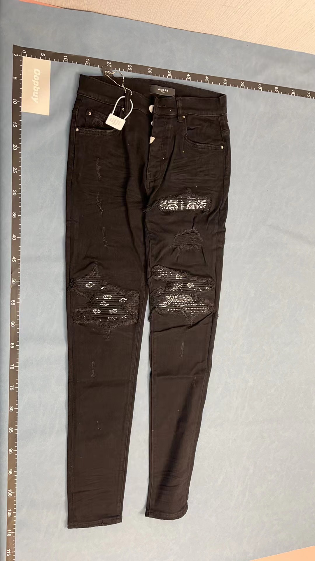 Black Ripped Denim Jeans with Patch Details