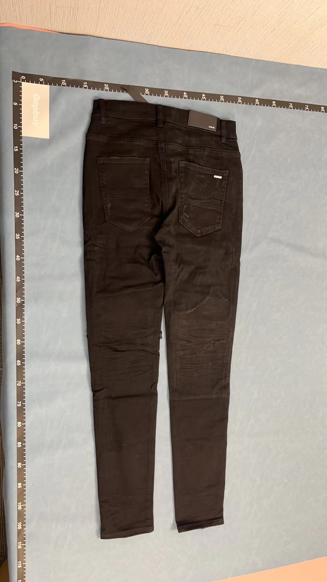 Black Ripped Denim Jeans with Patch Details