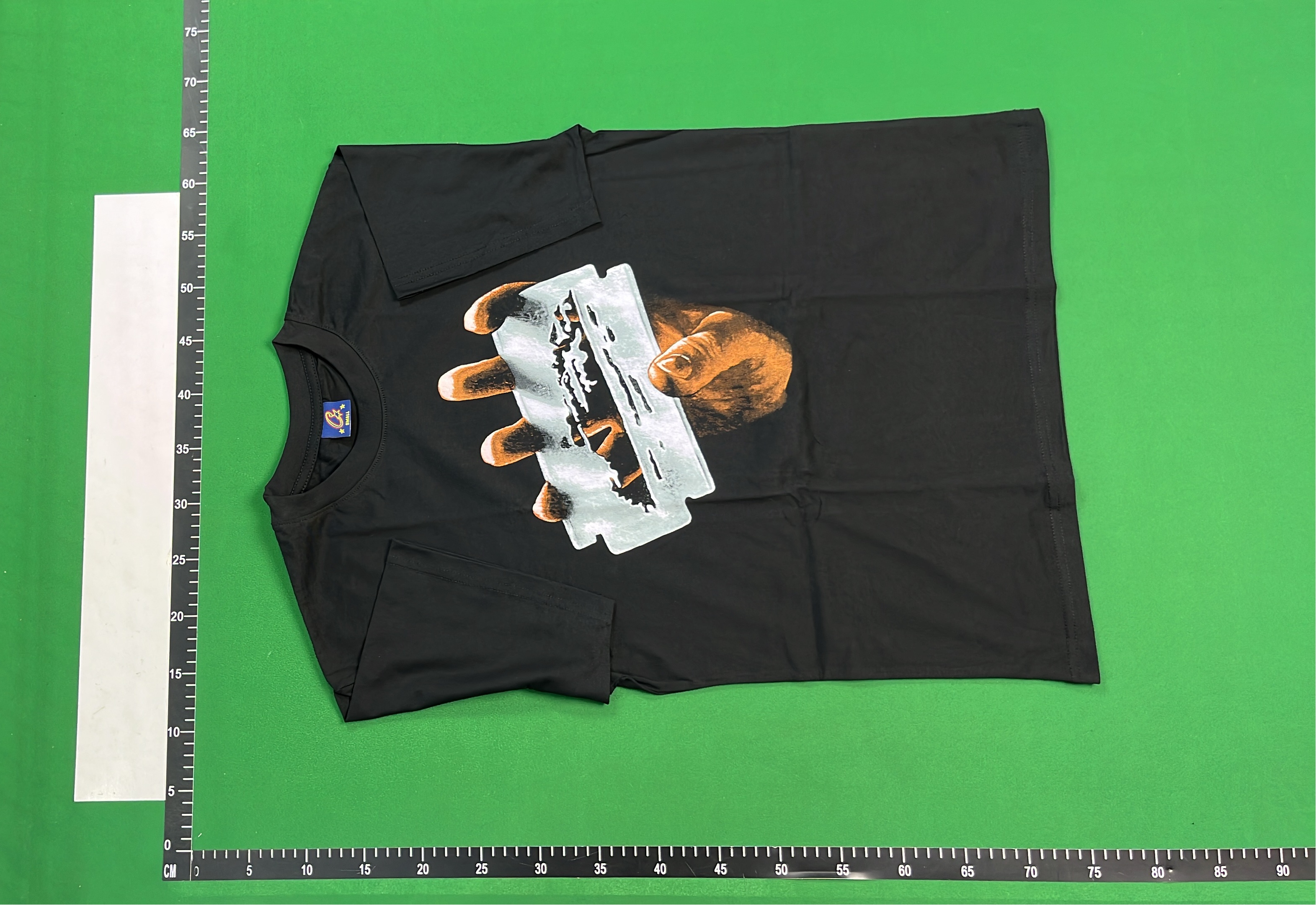 Black T-Shirt with Razor Blade Hand Graphic Design