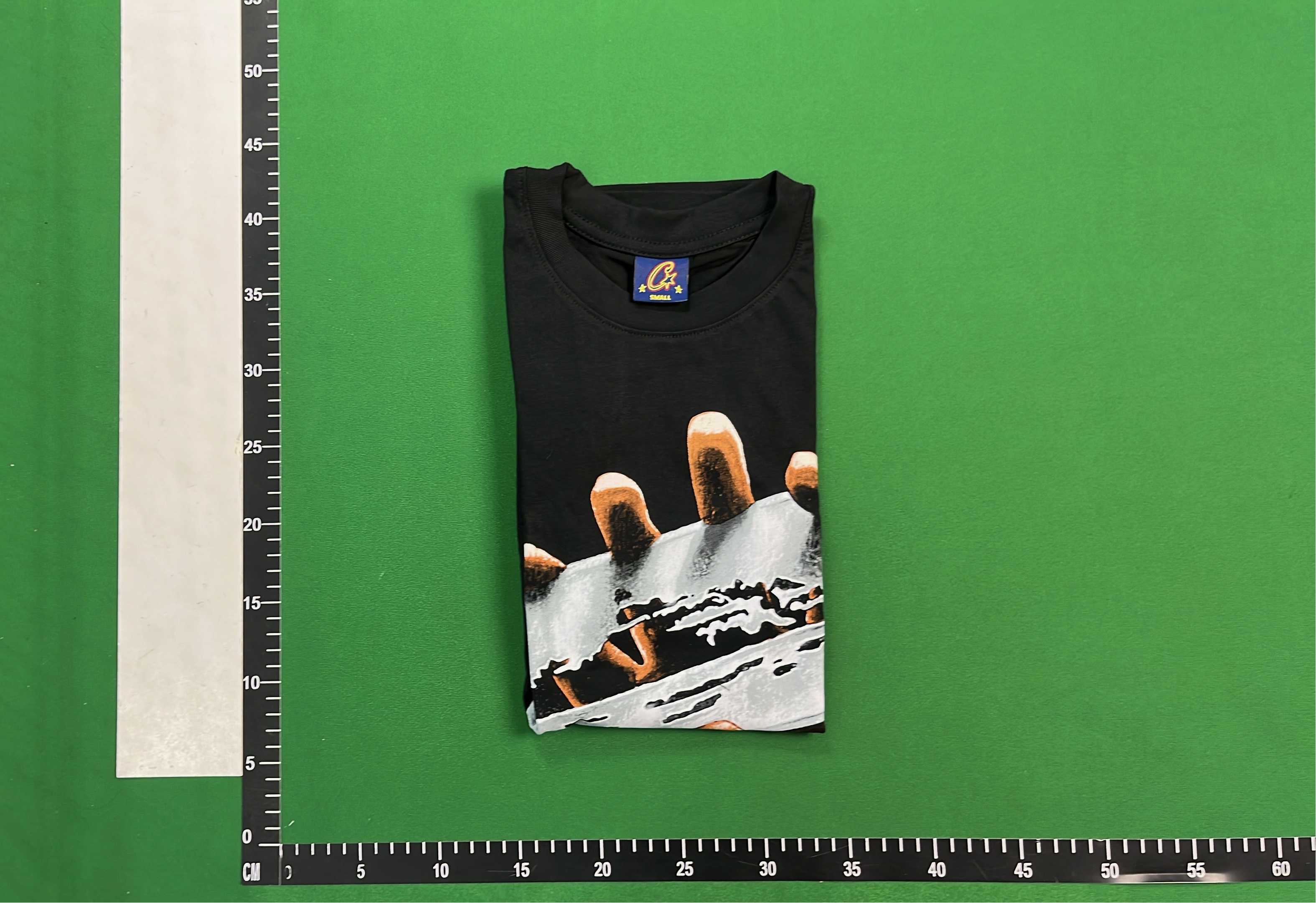 Black T-Shirt with Razor Blade Hand Graphic Design