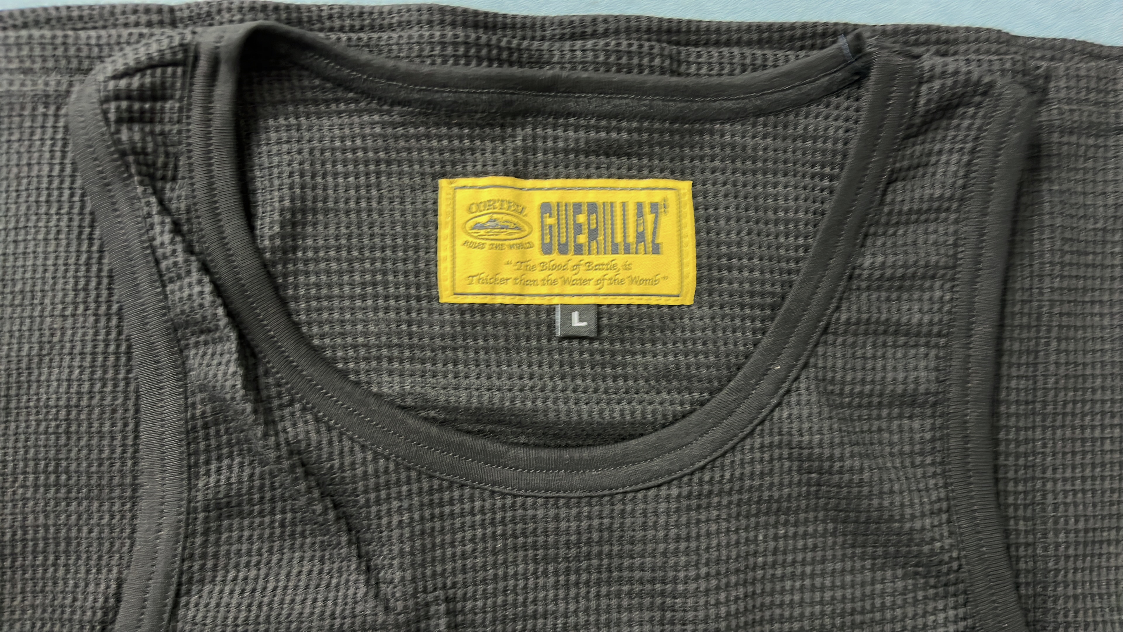 Black Ribbed Tank Top with Yellow Logo