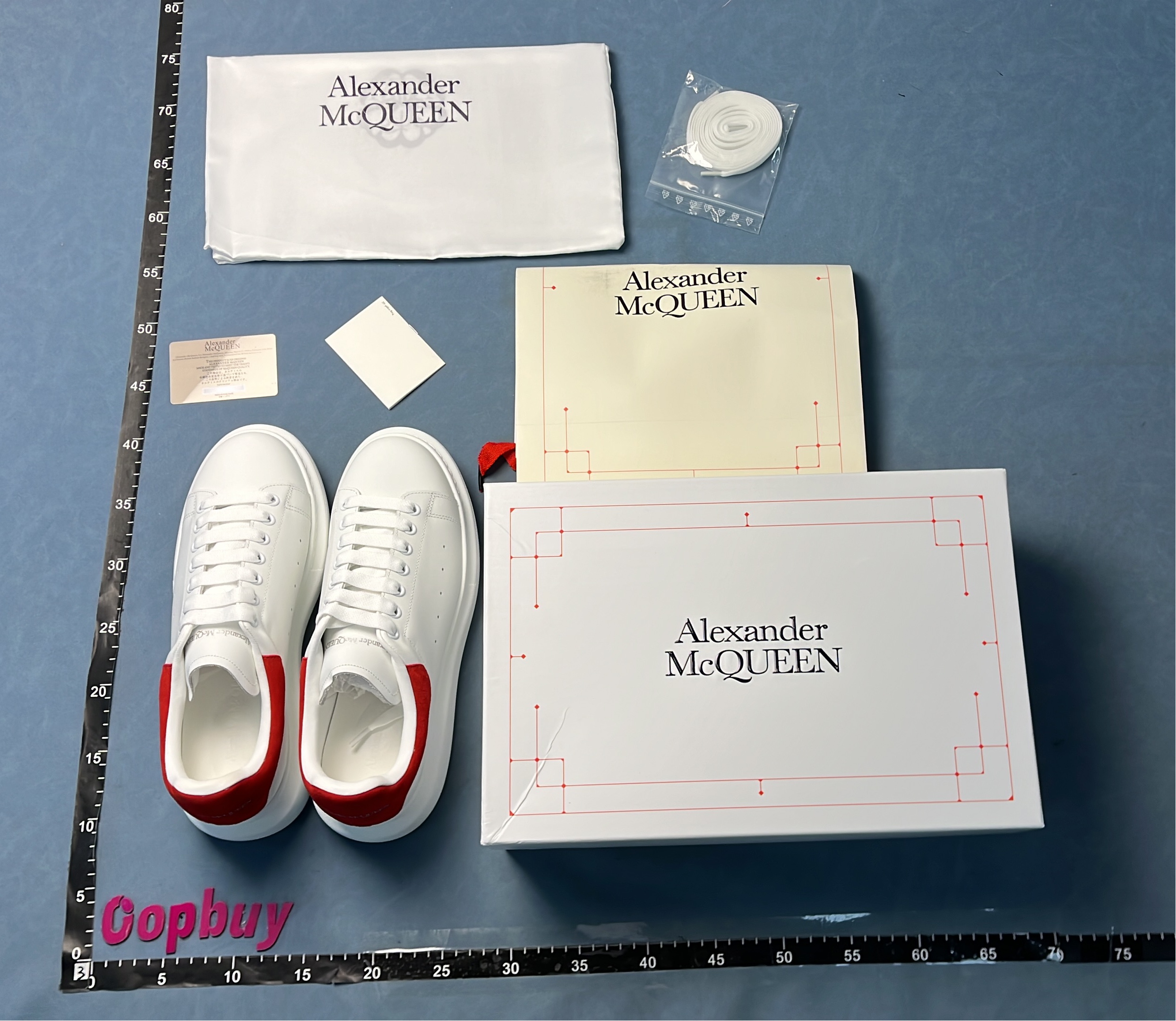 White Sneakers with Blue Heel Tab