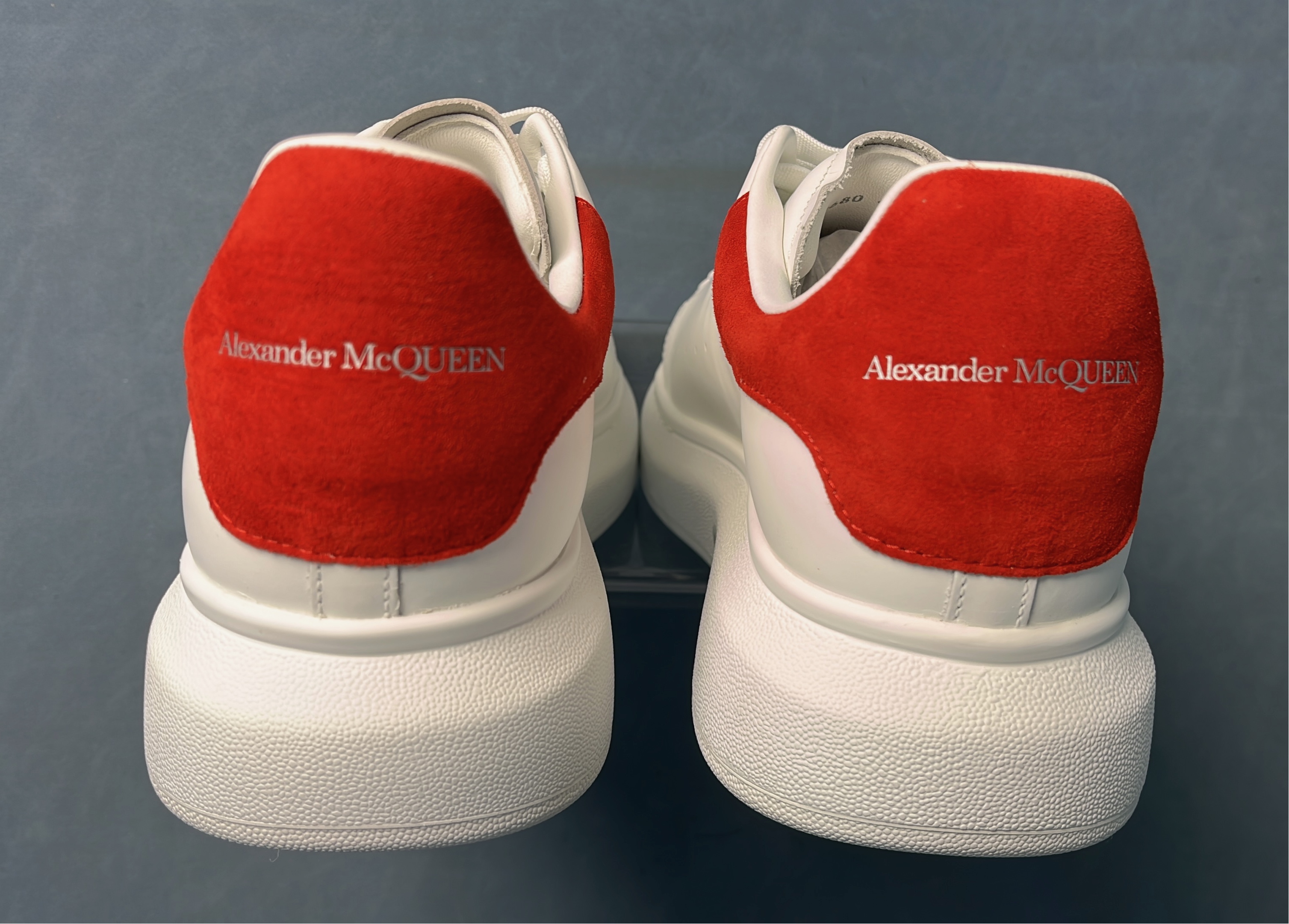 White Sneakers with Blue Heel Tab