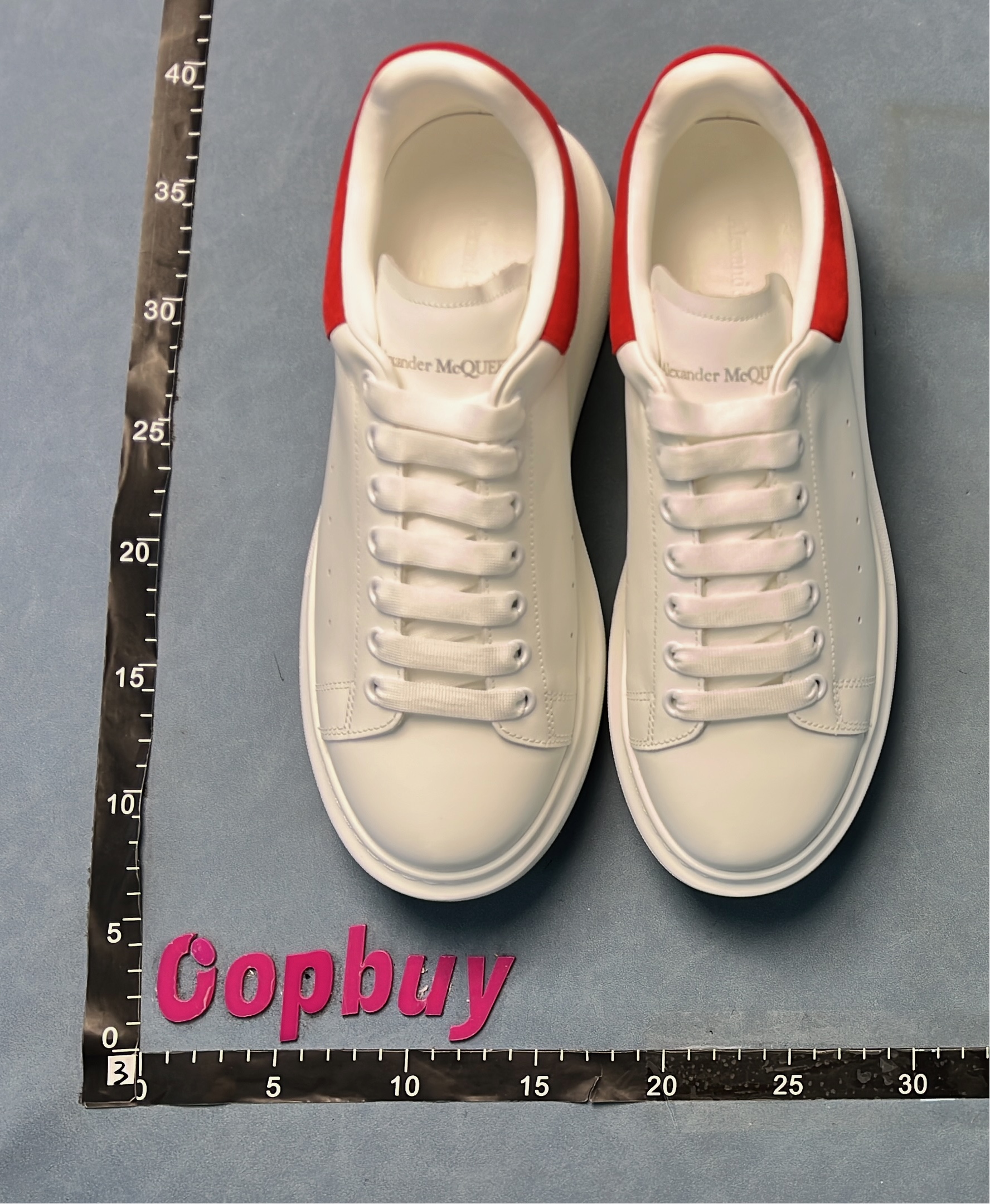 White Sneakers with Blue Heel Tab