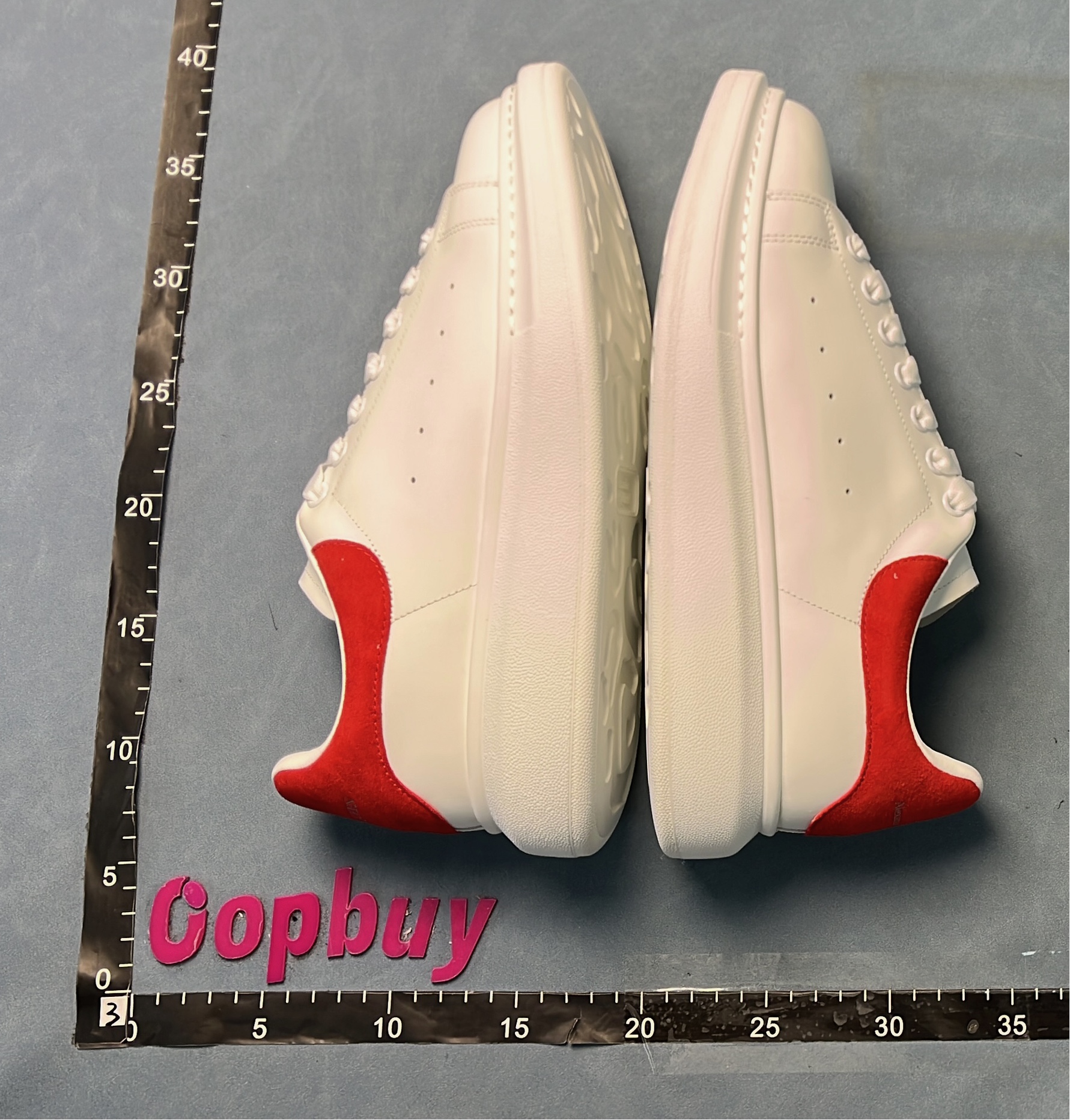 White Sneakers with Blue Heel Tab