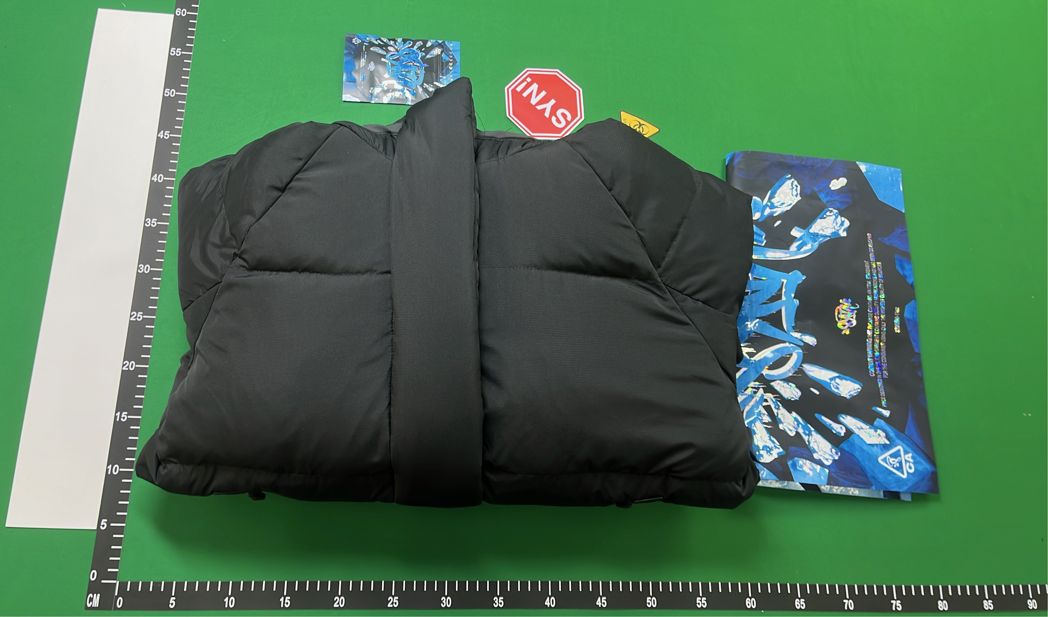 Black Puffer Jacket with Hood and Zippered Pockets