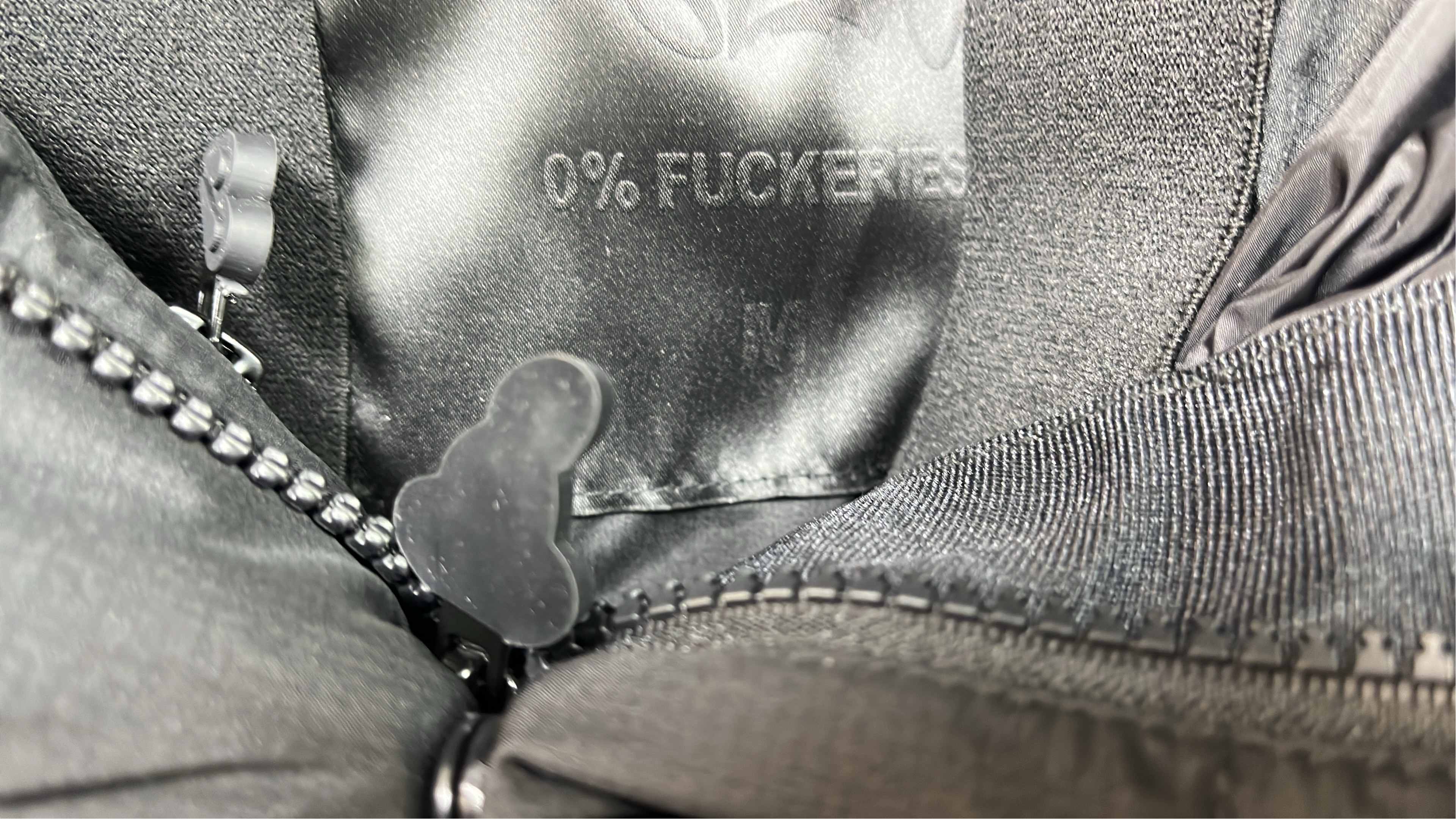 Black Puffer Jacket with Hood and Zippered Pockets