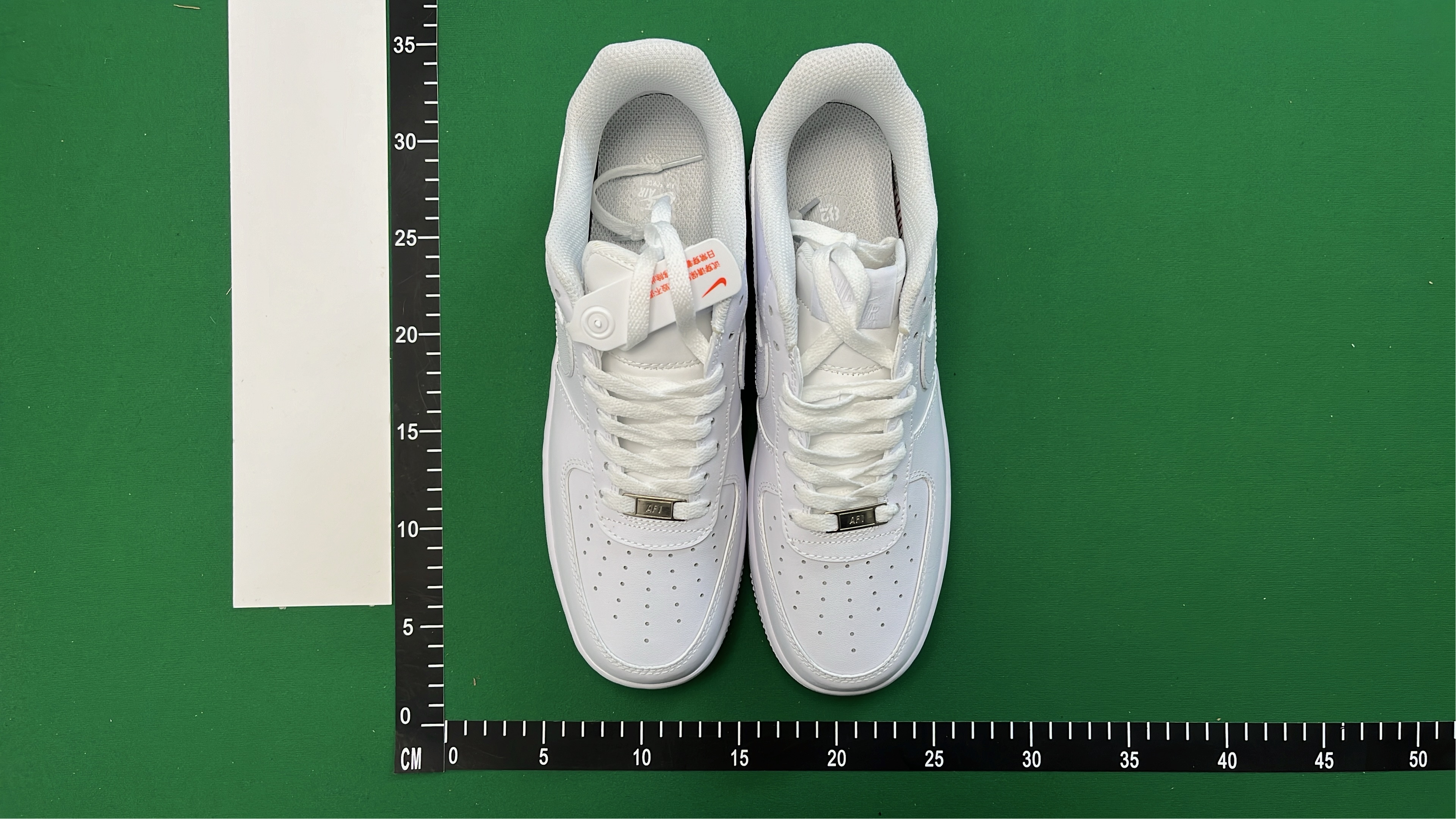 Supreme x Nike Air Force 1 Low White and Black Sneakers