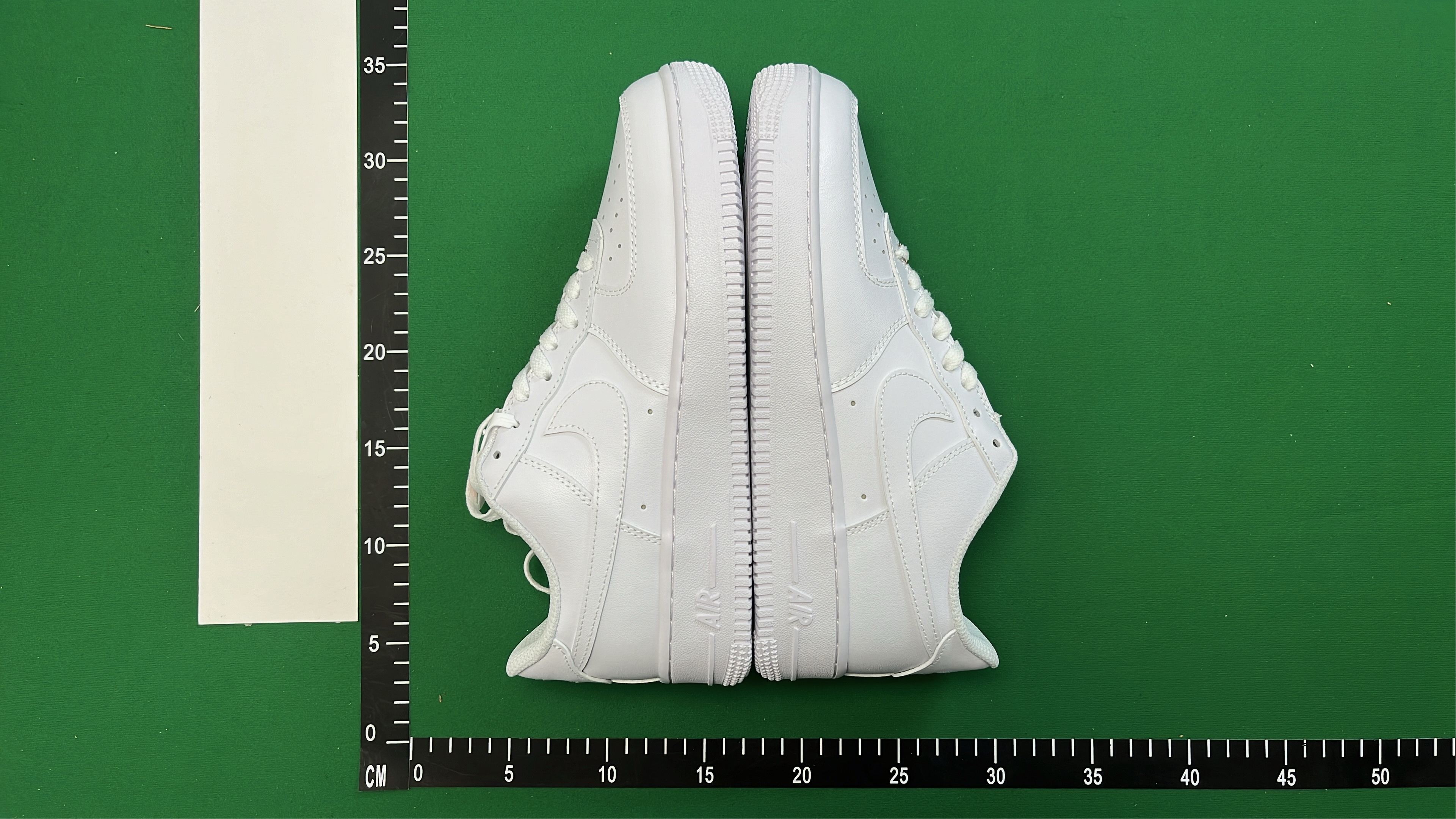 Supreme x Nike Air Force 1 Low White and Black Sneakers