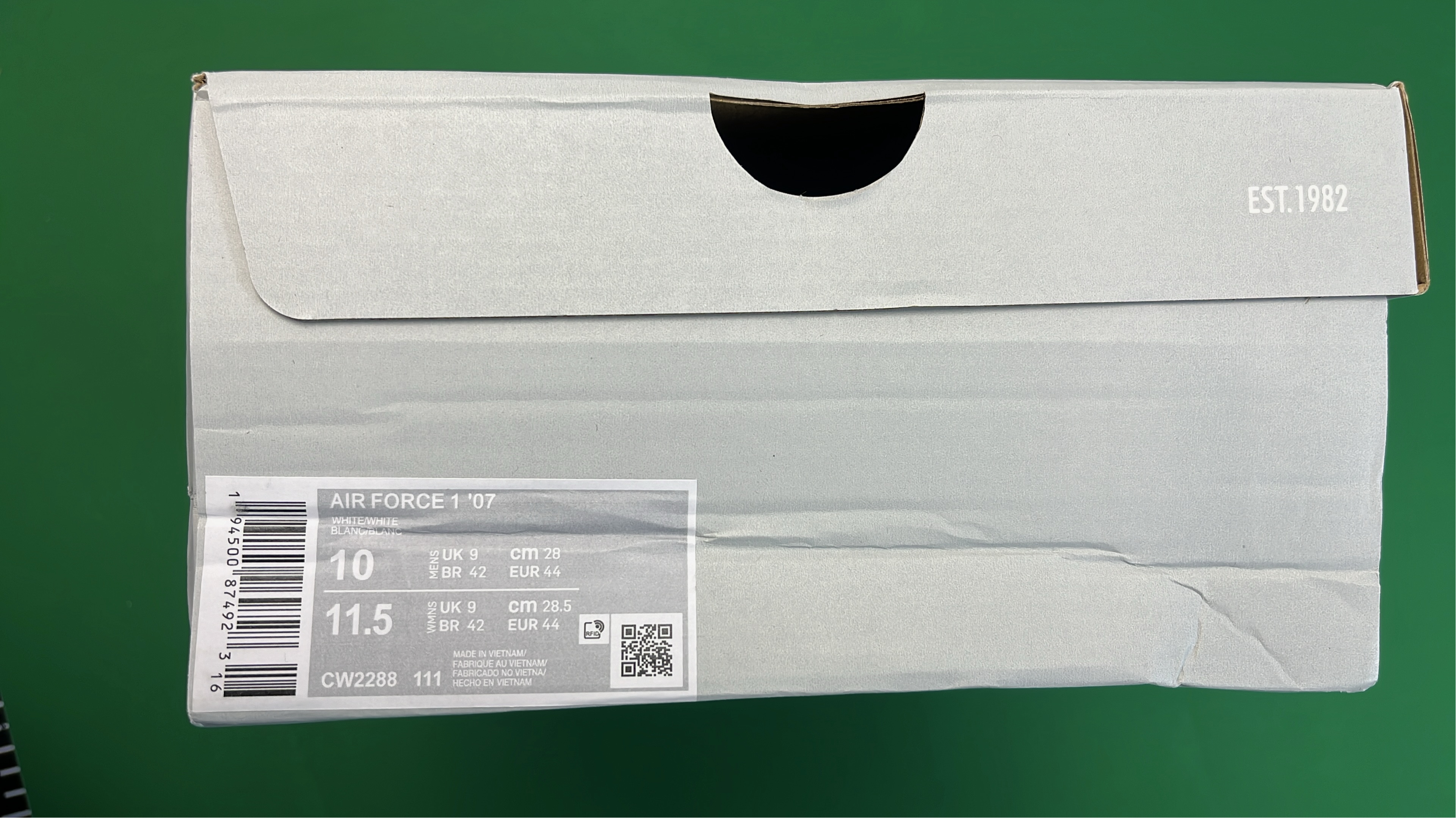 Supreme x Nike Air Force 1 Low White and Black Sneakers