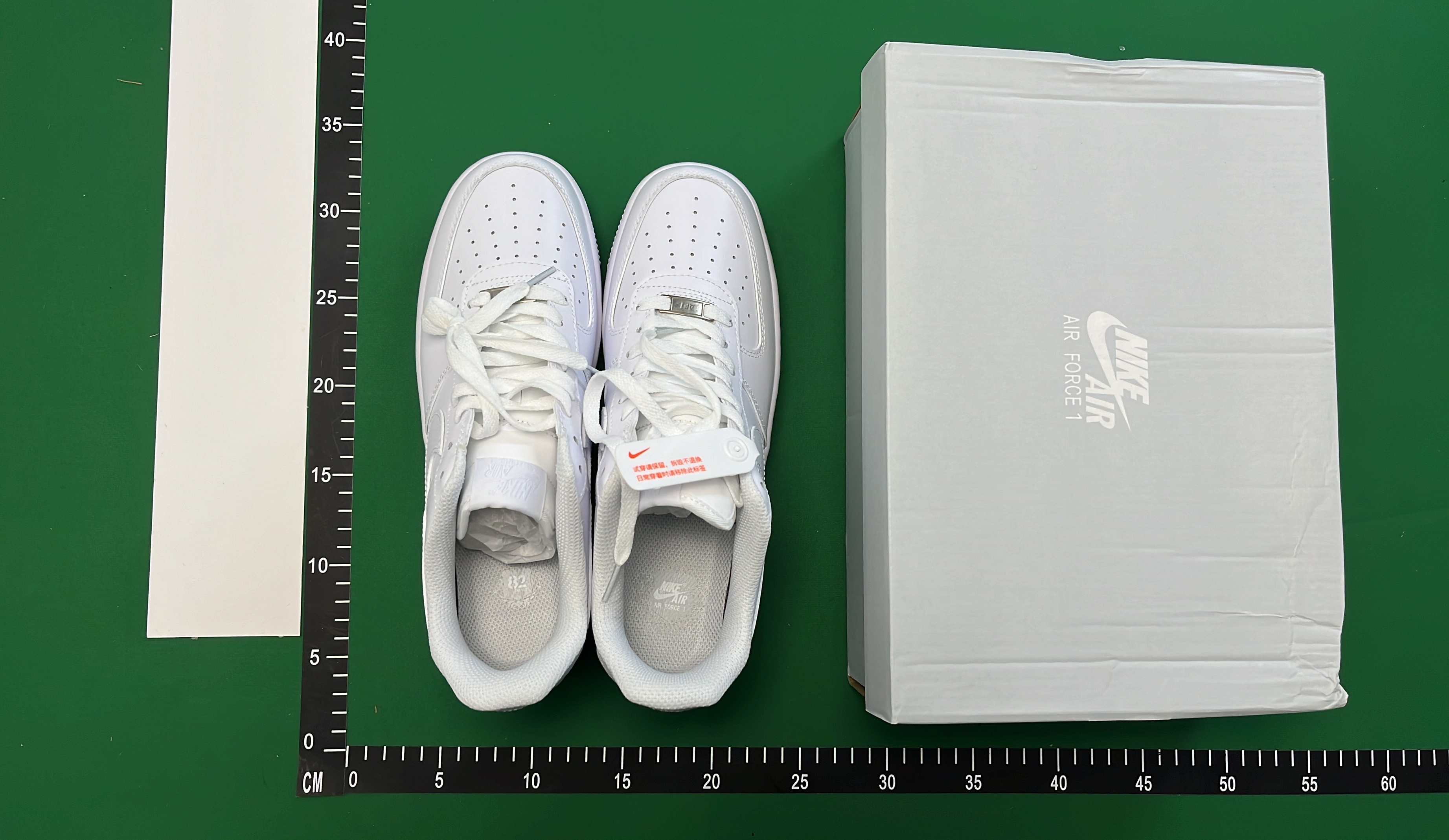 Supreme x Nike Air Force 1 Low White and Black Sneakers