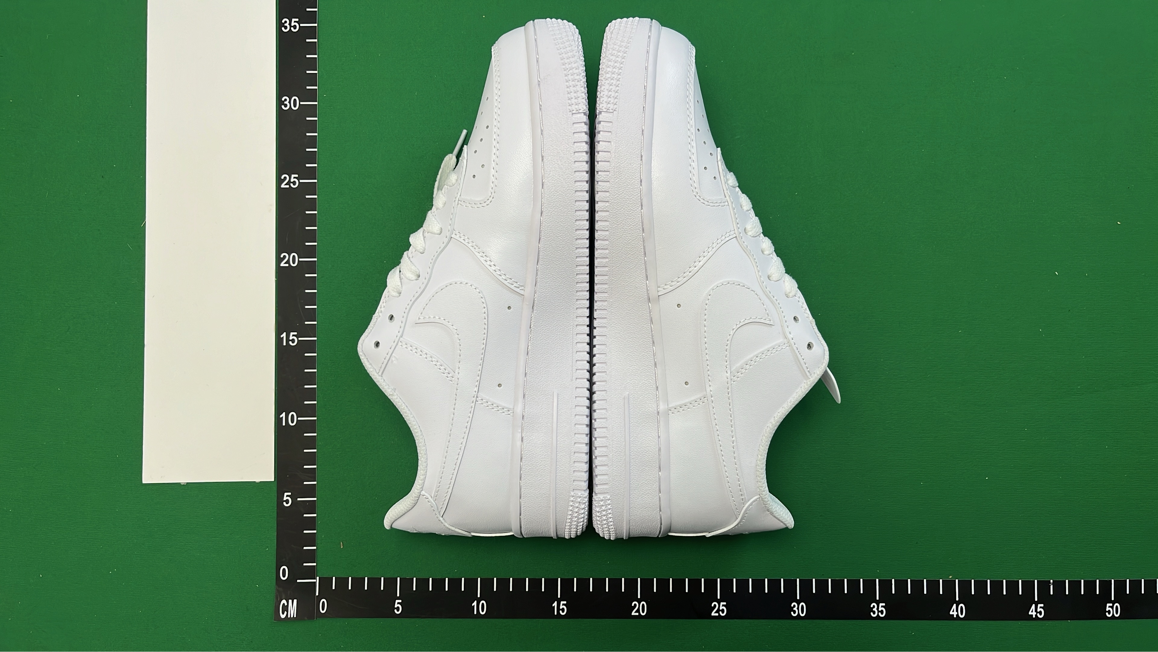 Supreme x Nike Air Force 1 Low White and Black Sneakers