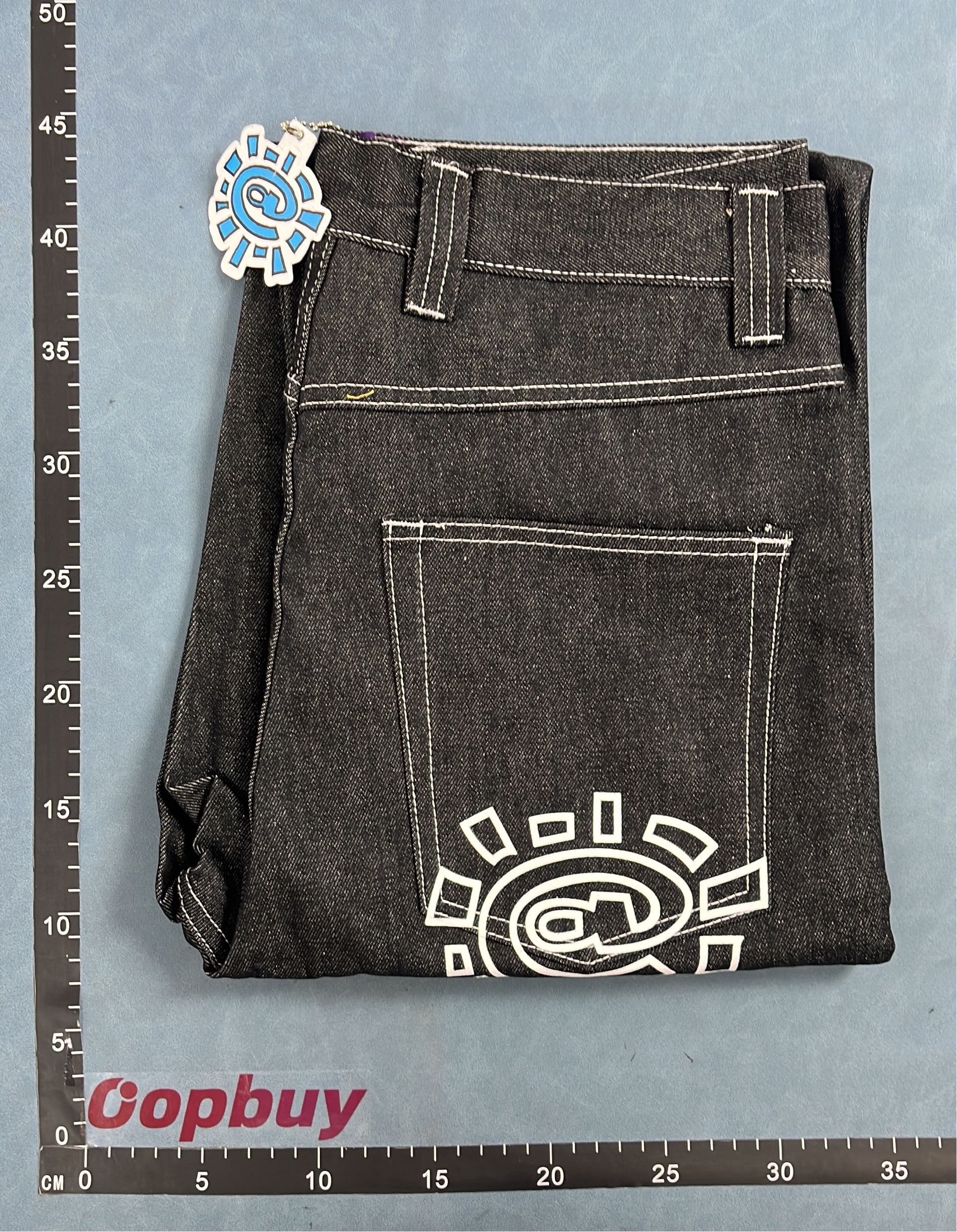 Light Blue and Black Denim Pants with Eye Patch Design