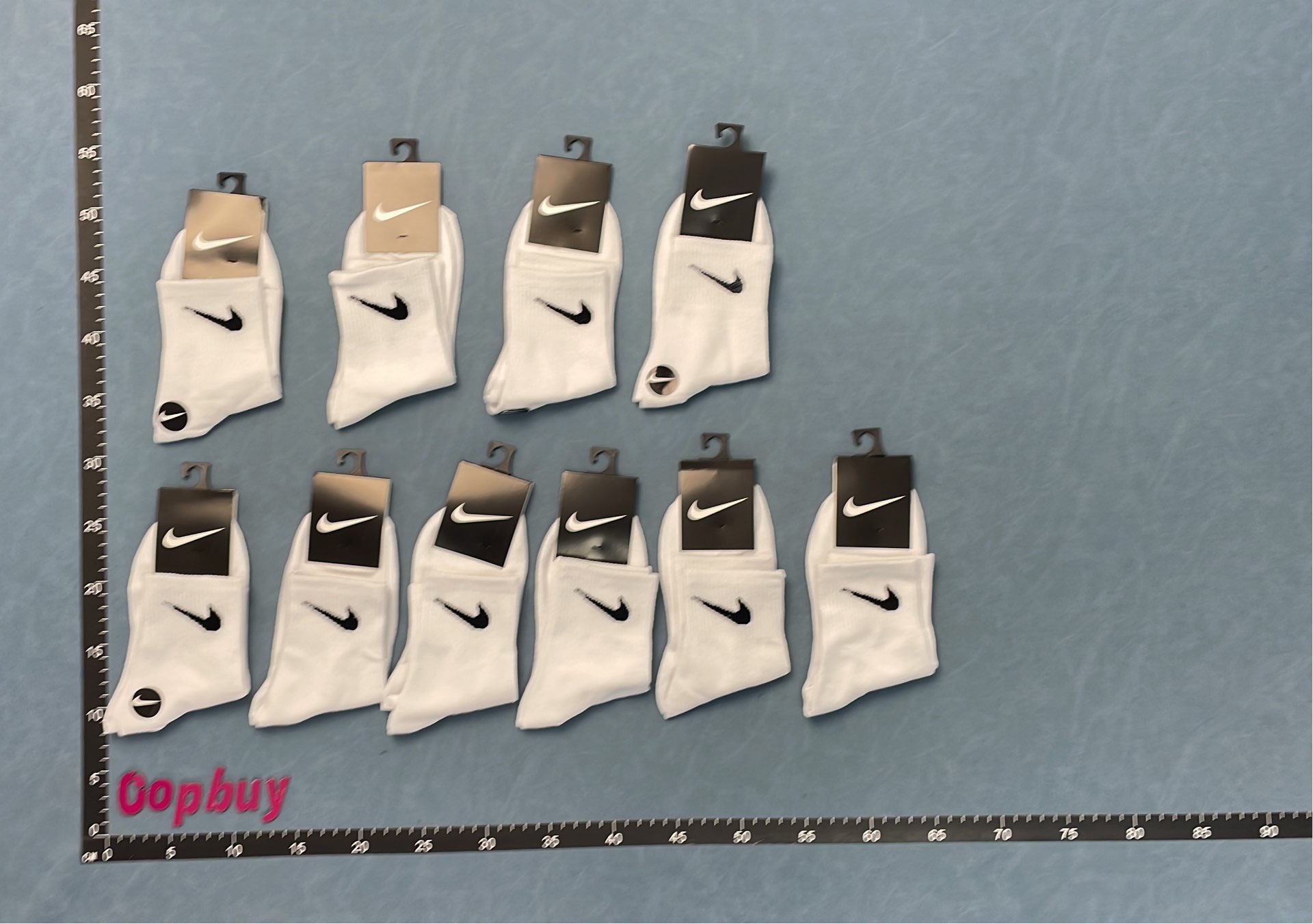 Nike Black Socks with White Swoosh Logo