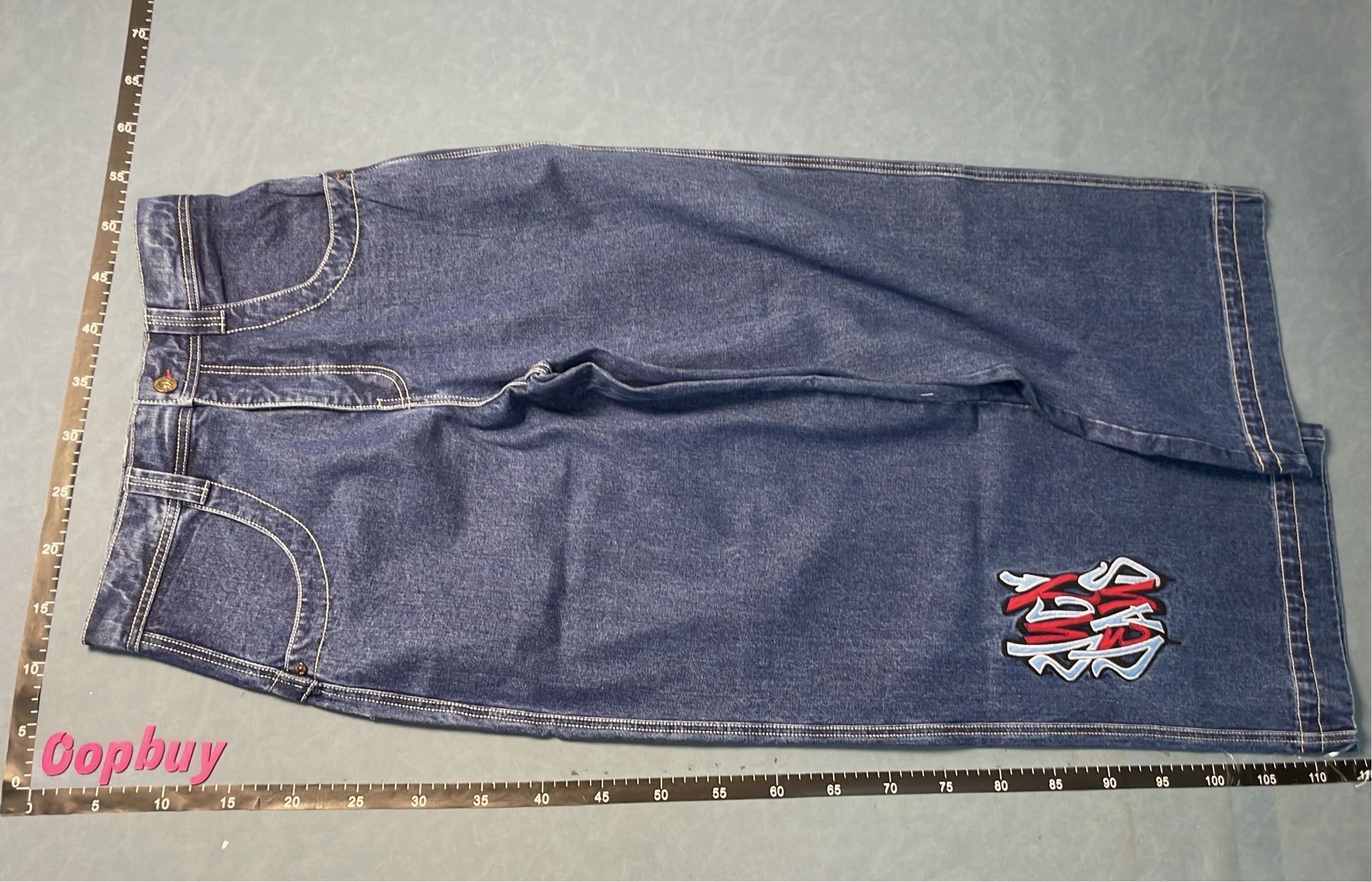 Stussy Wide Leg Denim Jeans with Graphic Patch