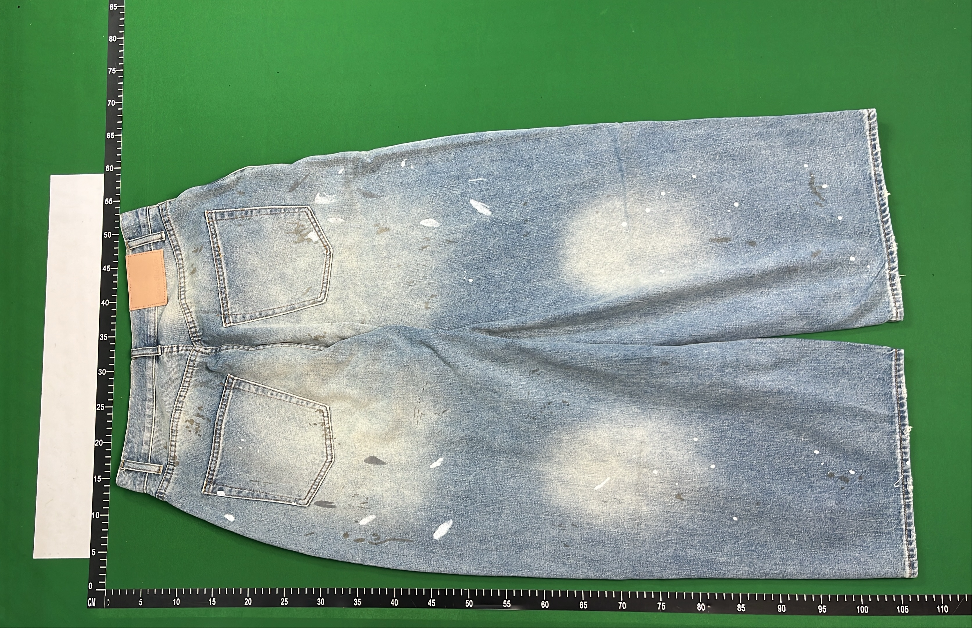 Distressed Wide Leg Denim Jeans with Paint Splatter Design