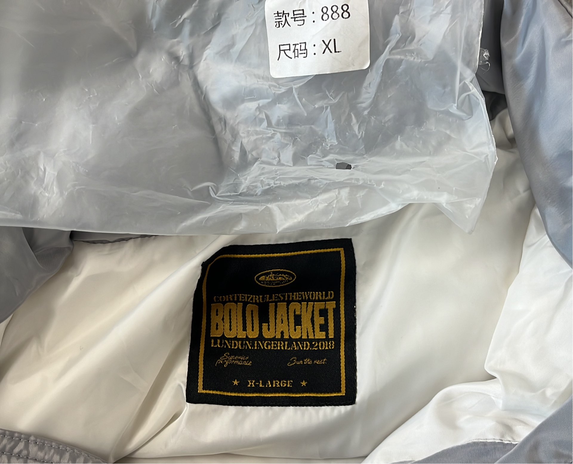 Black Puffer Jacket with Gold Logo - Cootie