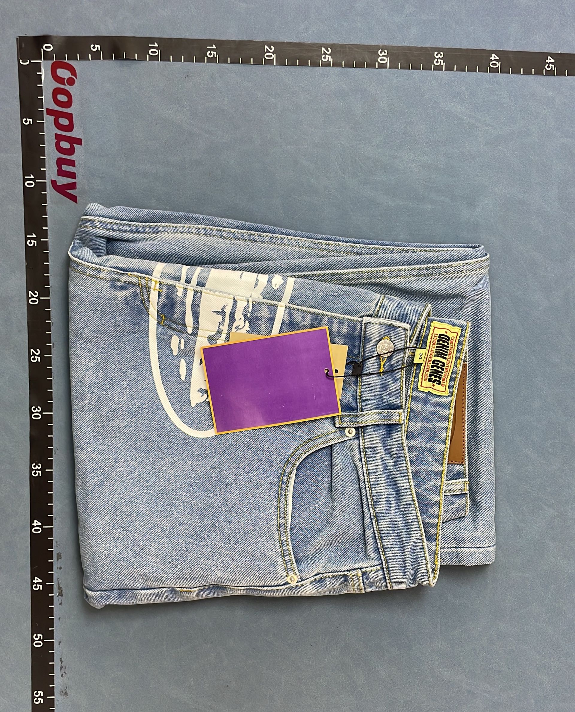 Light Blue Distressed Jeans with Unique Print