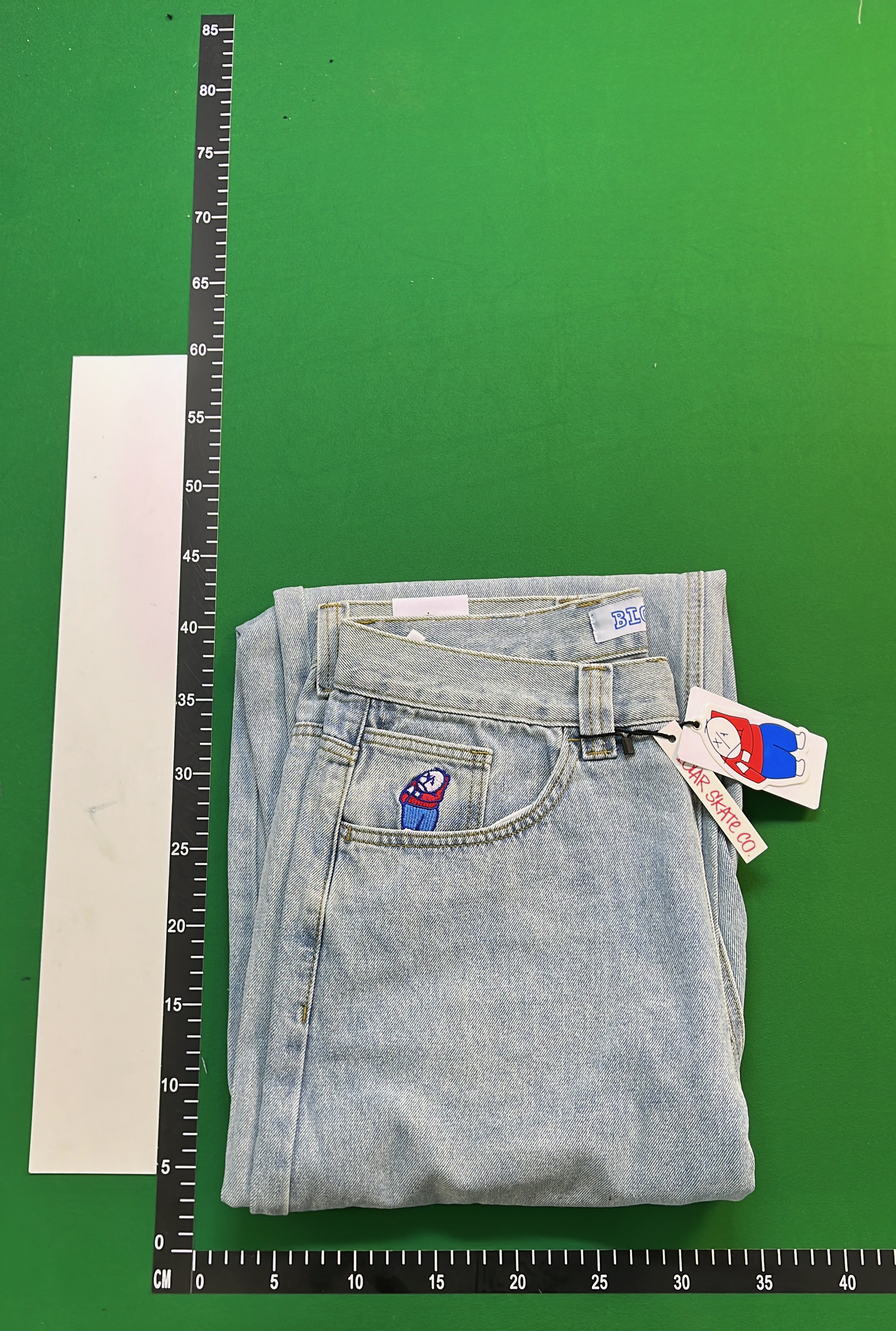 Light Blue Denim Jeans with Embroidered Pocket Design