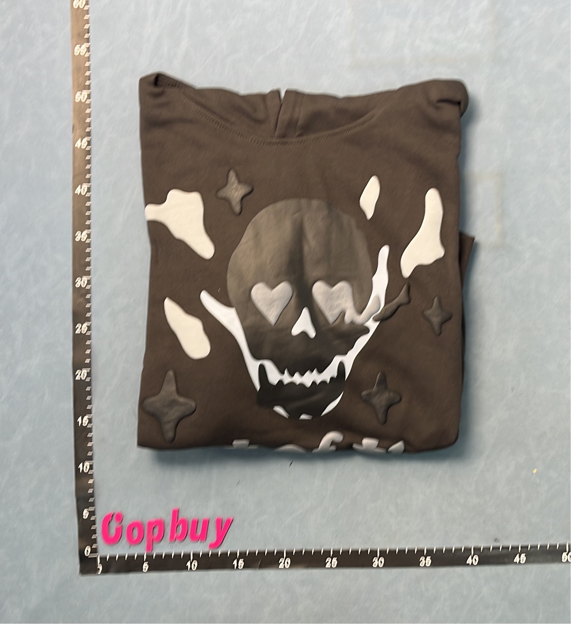 Skull Hoodie with Heart Eyes Design