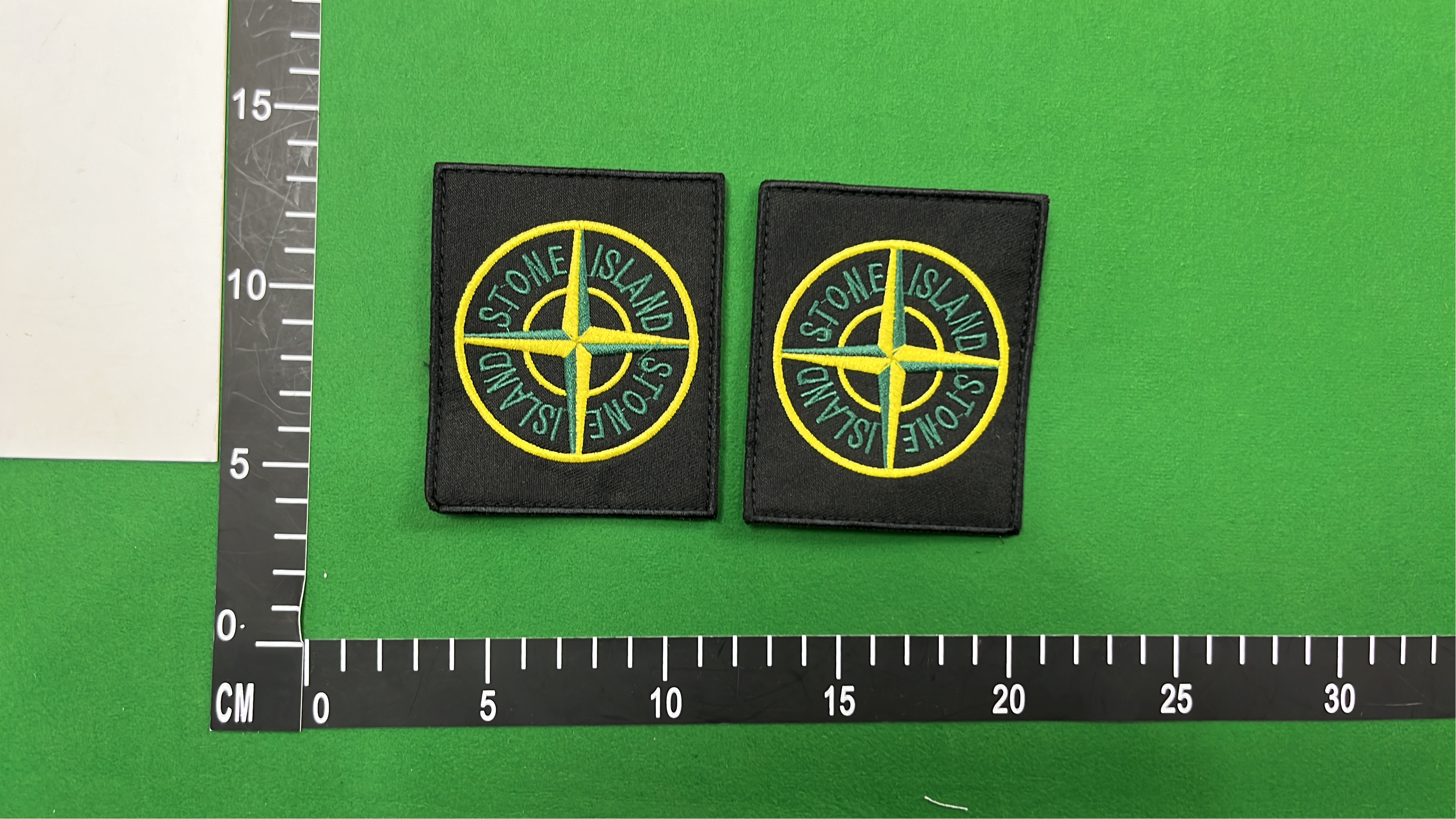 Stone Island Black Hooded Jacket with Logo Patch