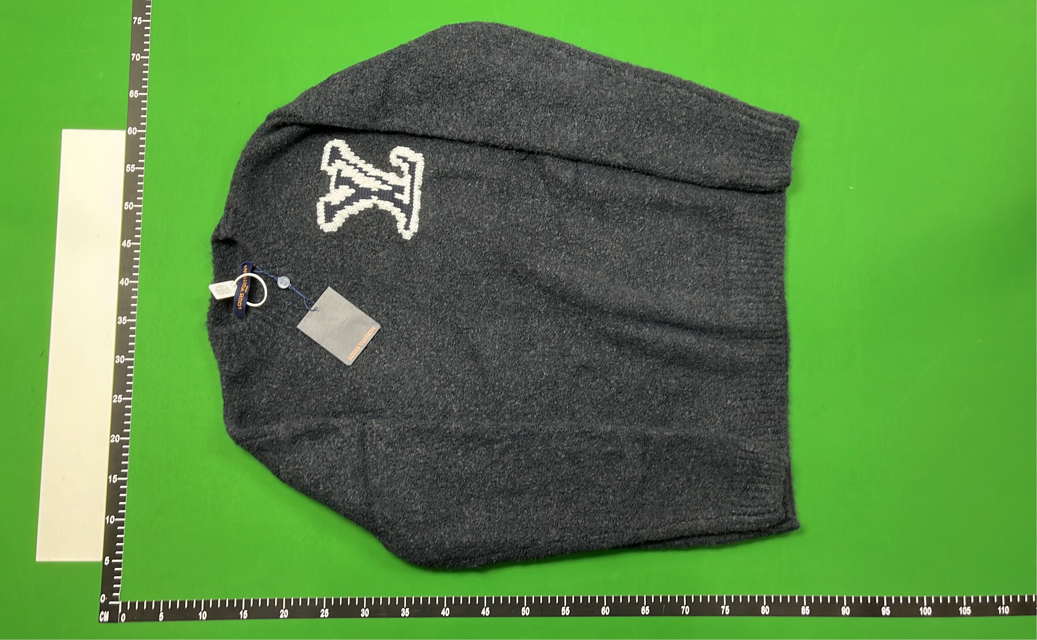 Navy Blue Knit Sweater with White Logo Design