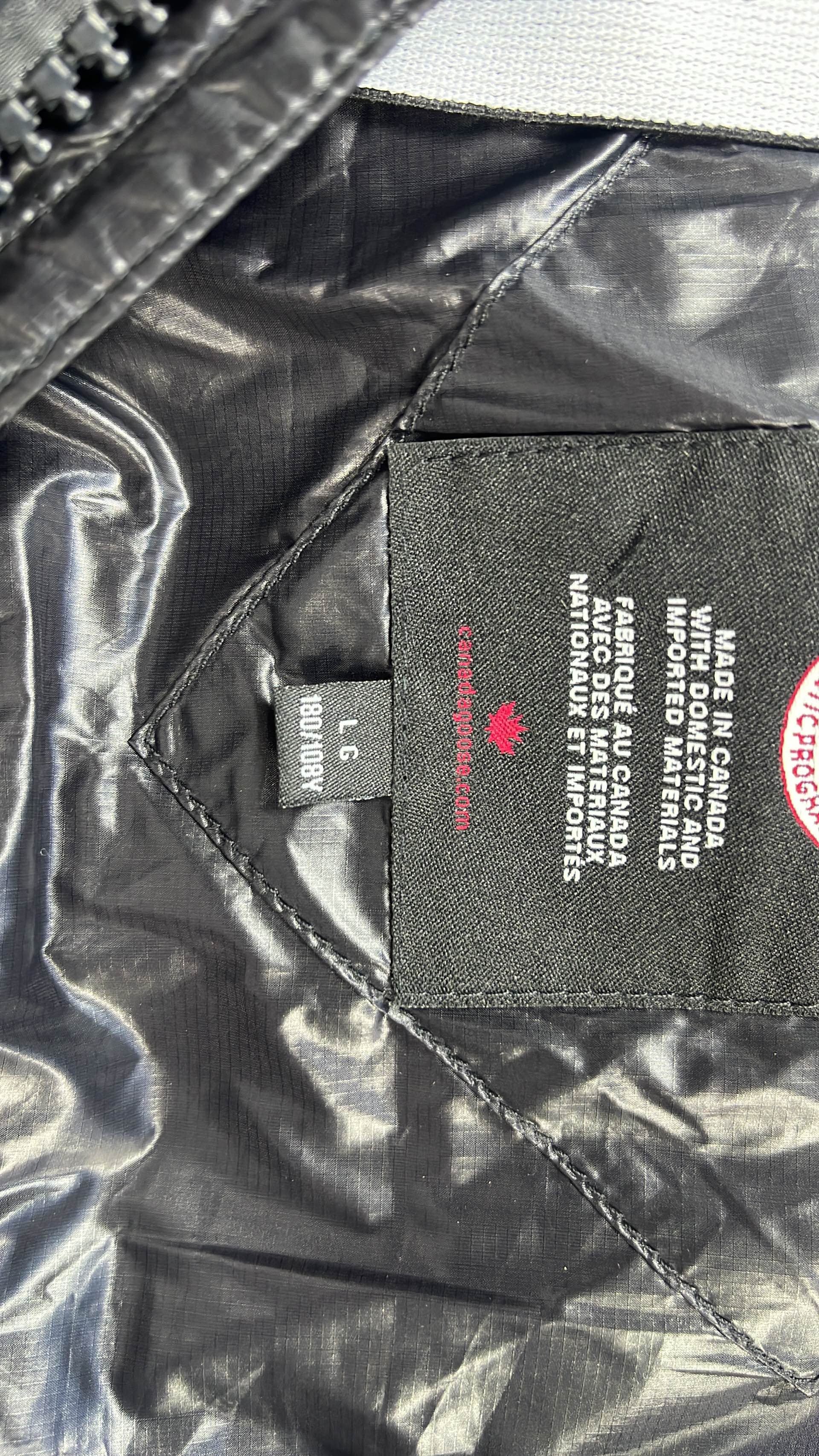 Canada Goose Black Down Jacket with Hood and Logo Patch