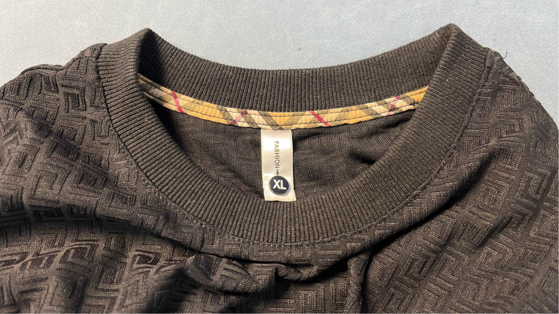 White Geometric Pattern Sweatshirt with Plaid Cuffs and Crest