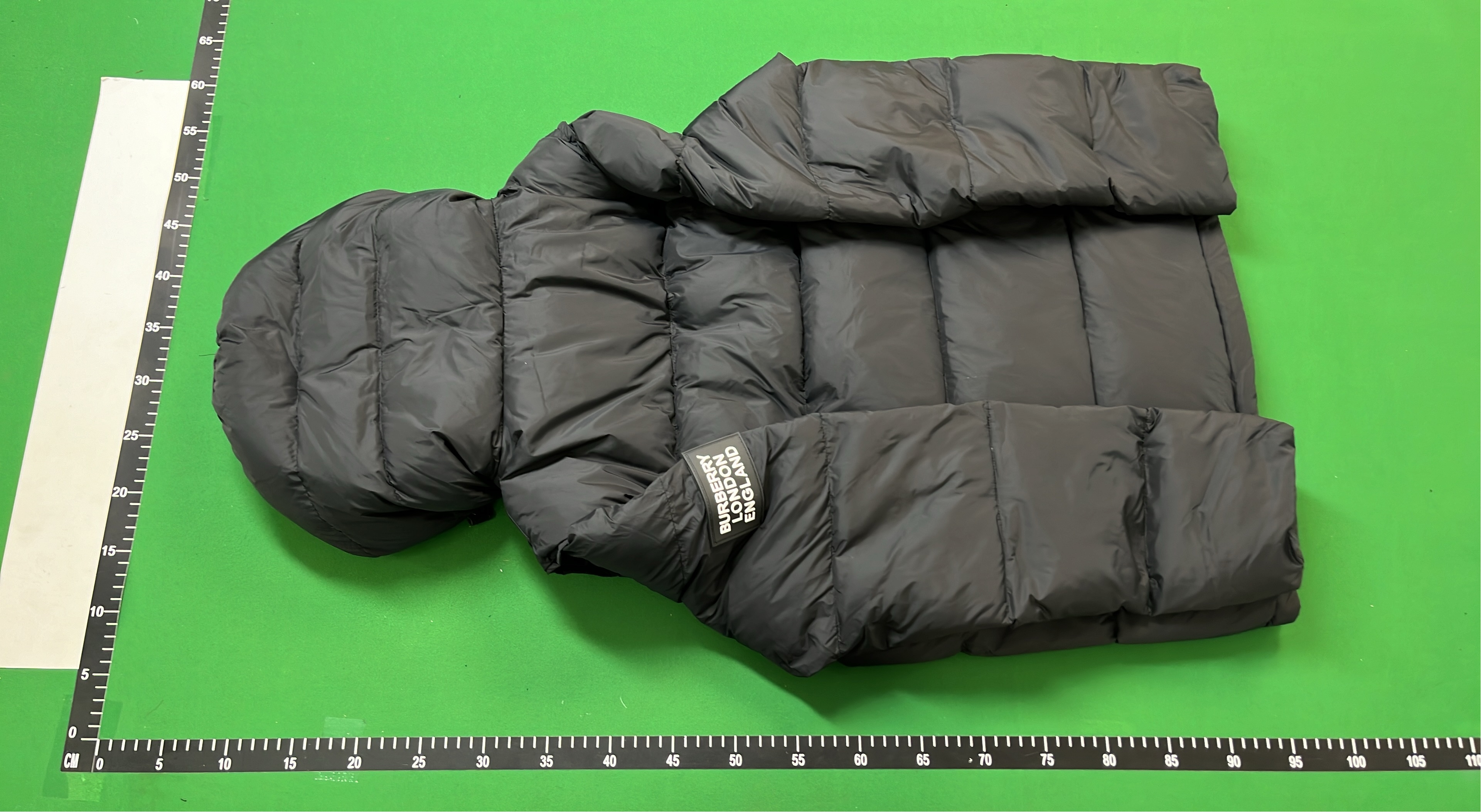 Black Puffer Jacket with Check Hood