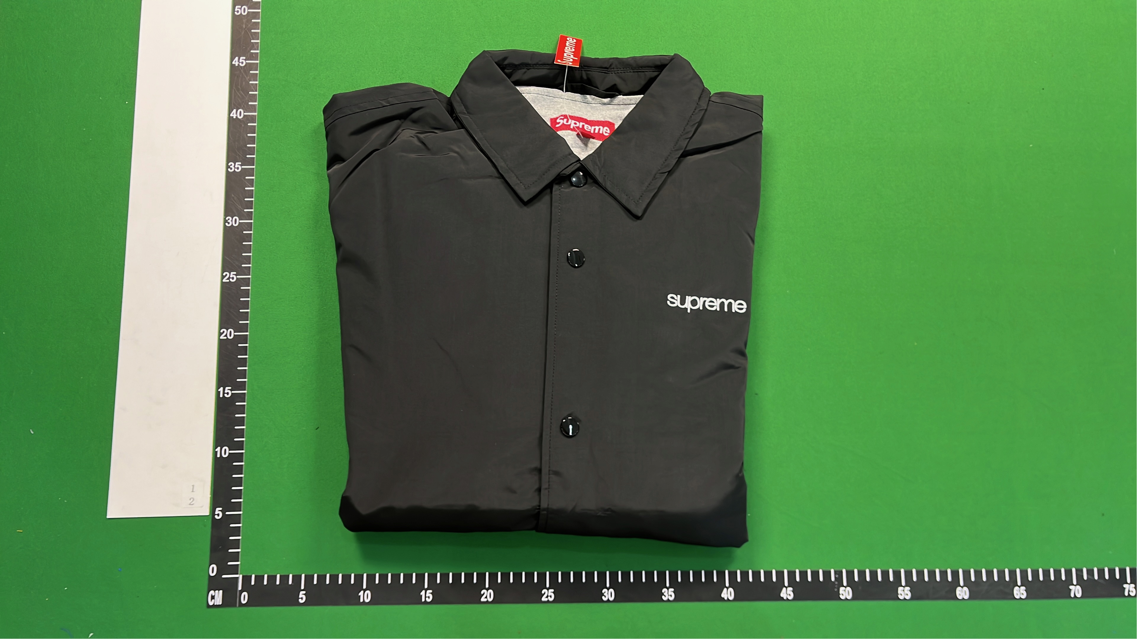Supreme Coach Jacket in Orange, Black, Green, Navy - New York City