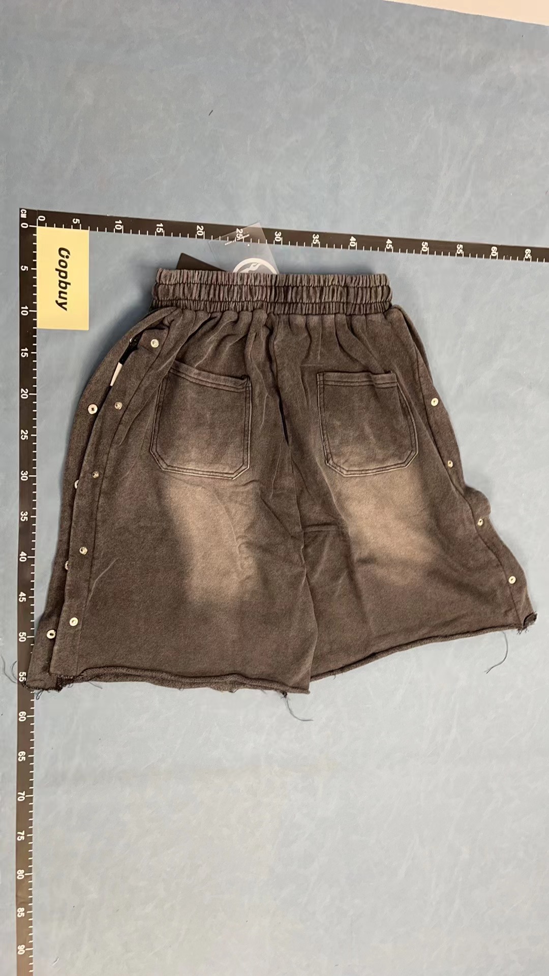 Gray Drawstring Shorts with Embroidered Logo and Side Buttons
