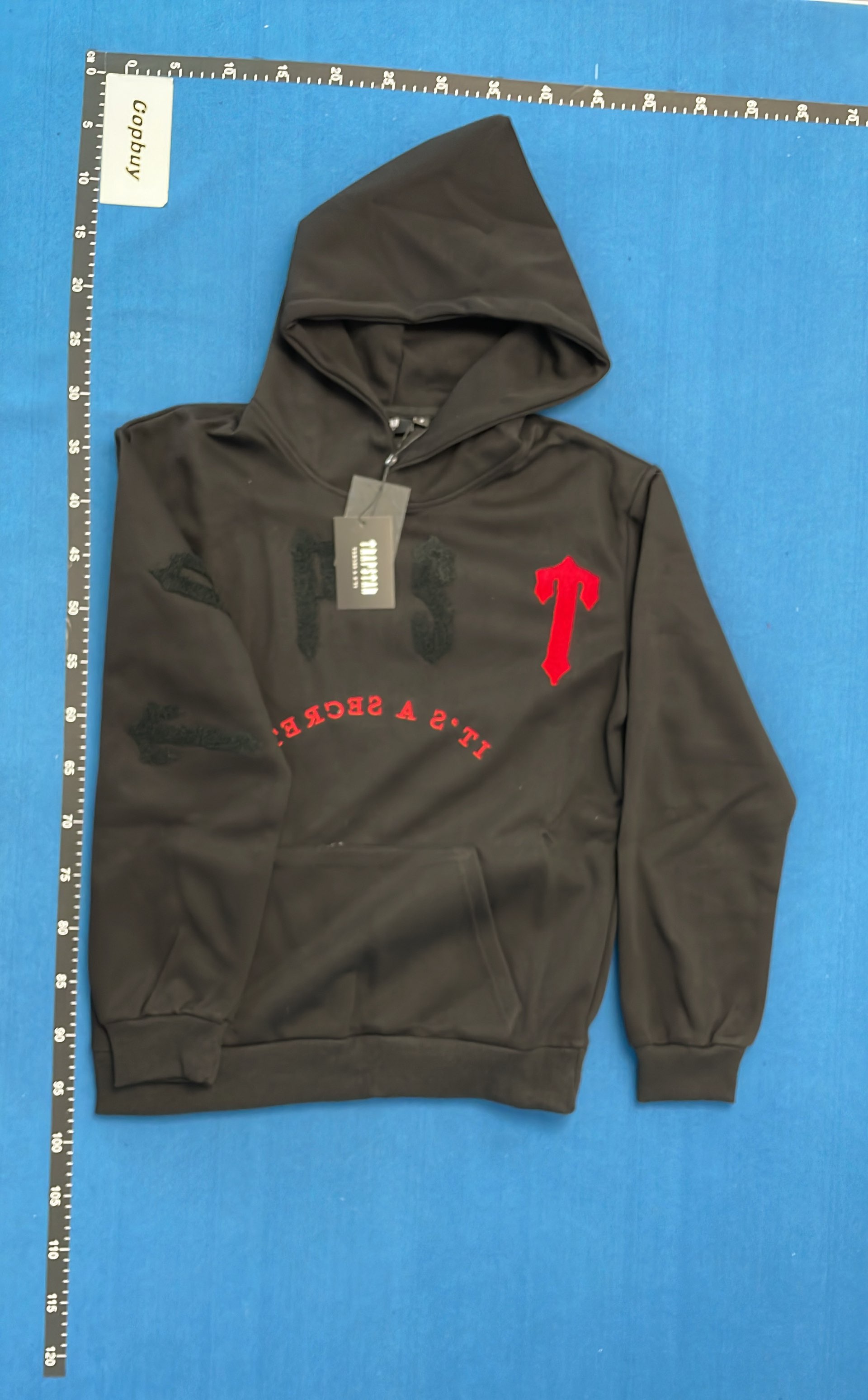 Black Jacket with Red Accents and White Stripe Design