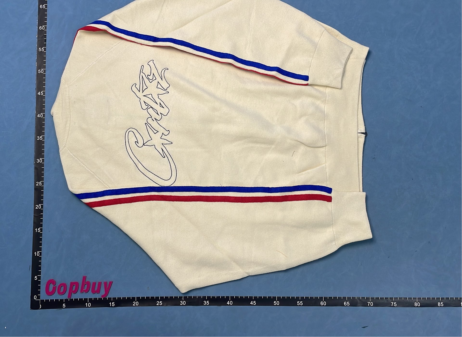 Cream Track Jacket with Red and Blue Stripes