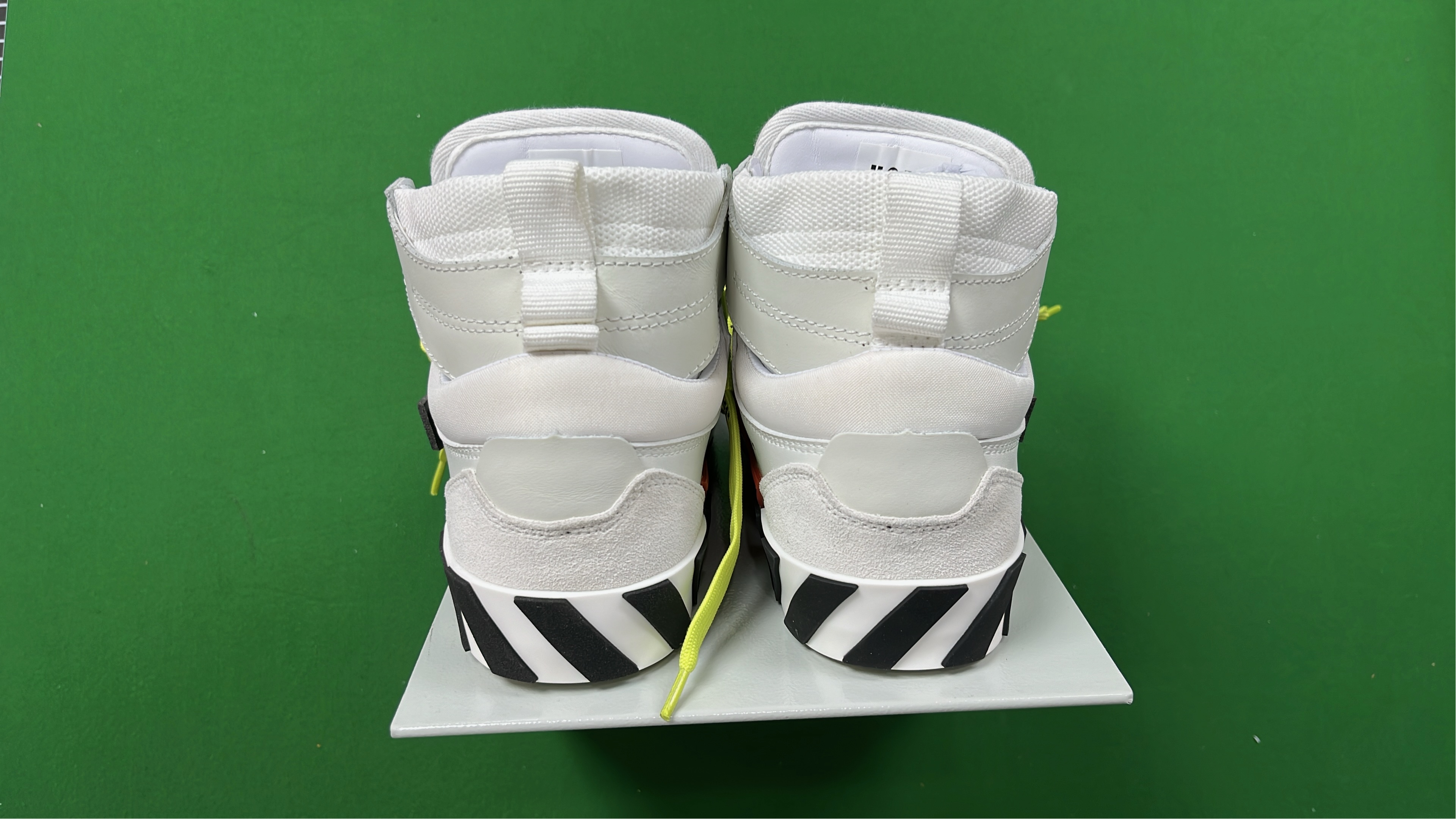 Off-White High Top Sneakers with Black Stripes